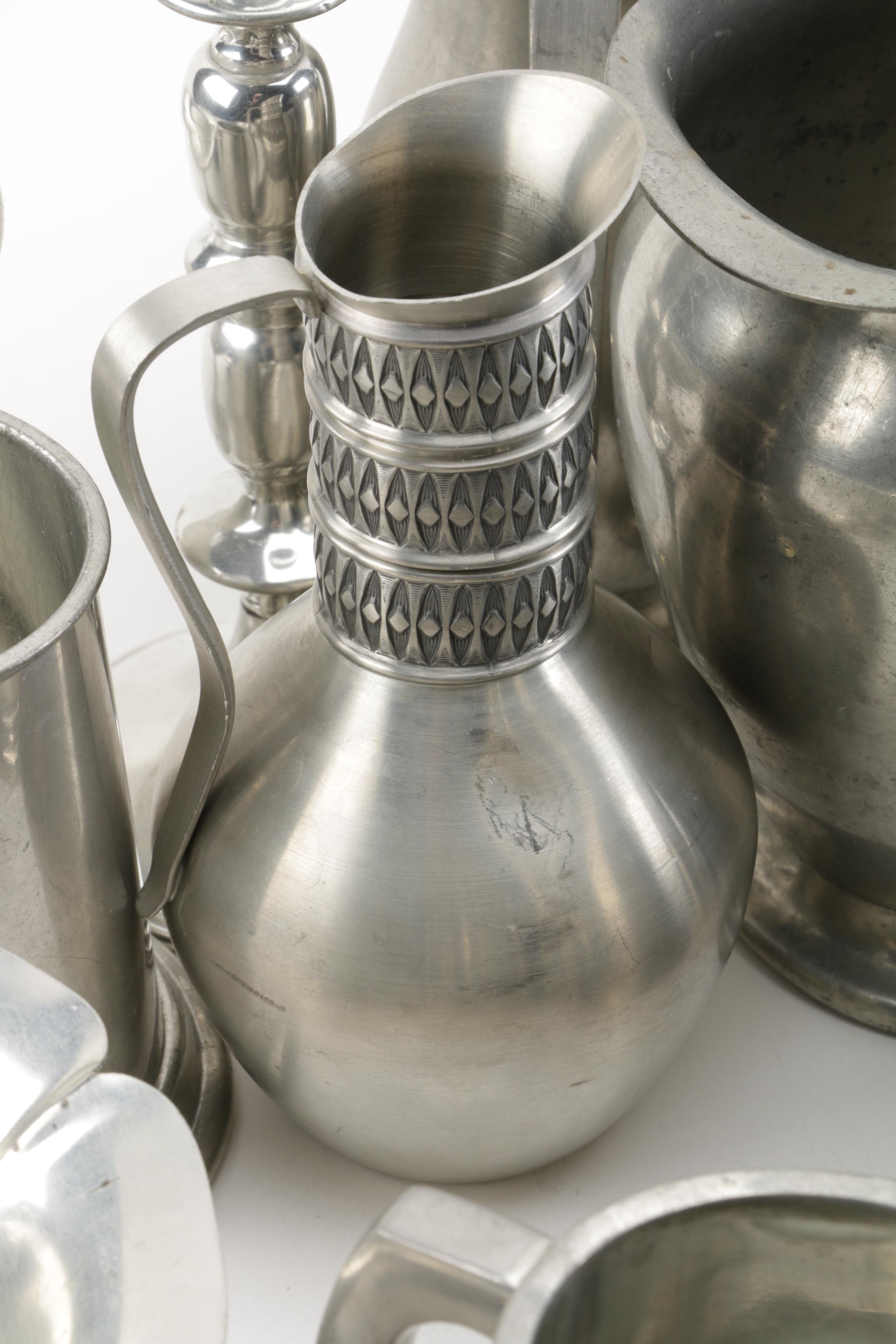 Large Assortment of Pewter Serveware Featuring Crescent Pewter