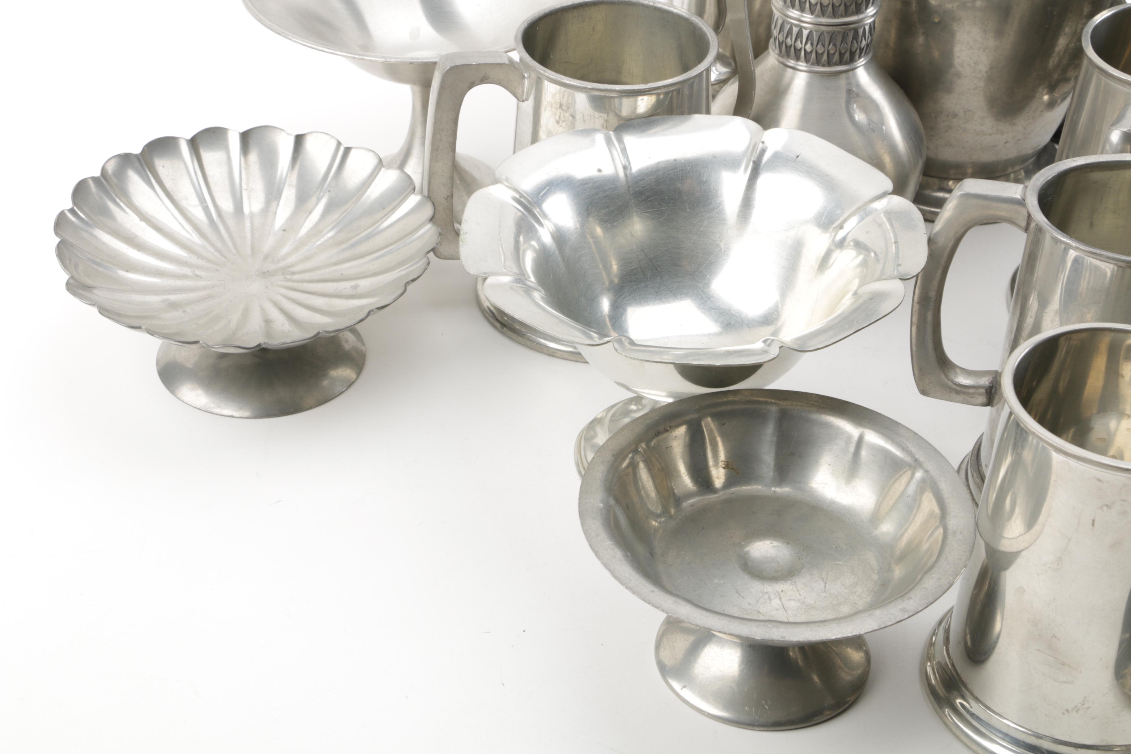 Large Assortment of Pewter Serveware Featuring Crescent Pewter
