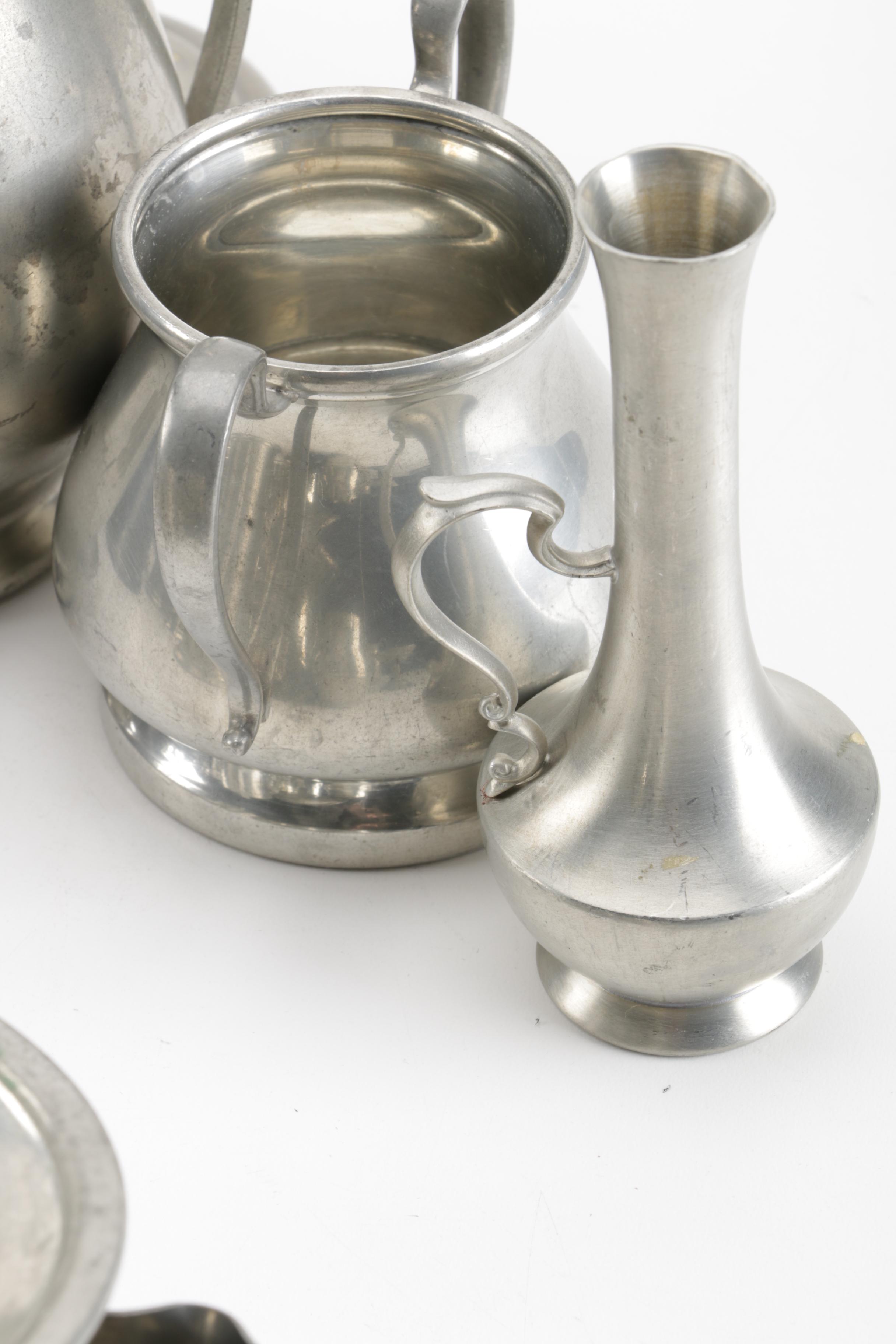 Large Assortment of Pewter Serveware Featuring Crescent Pewter