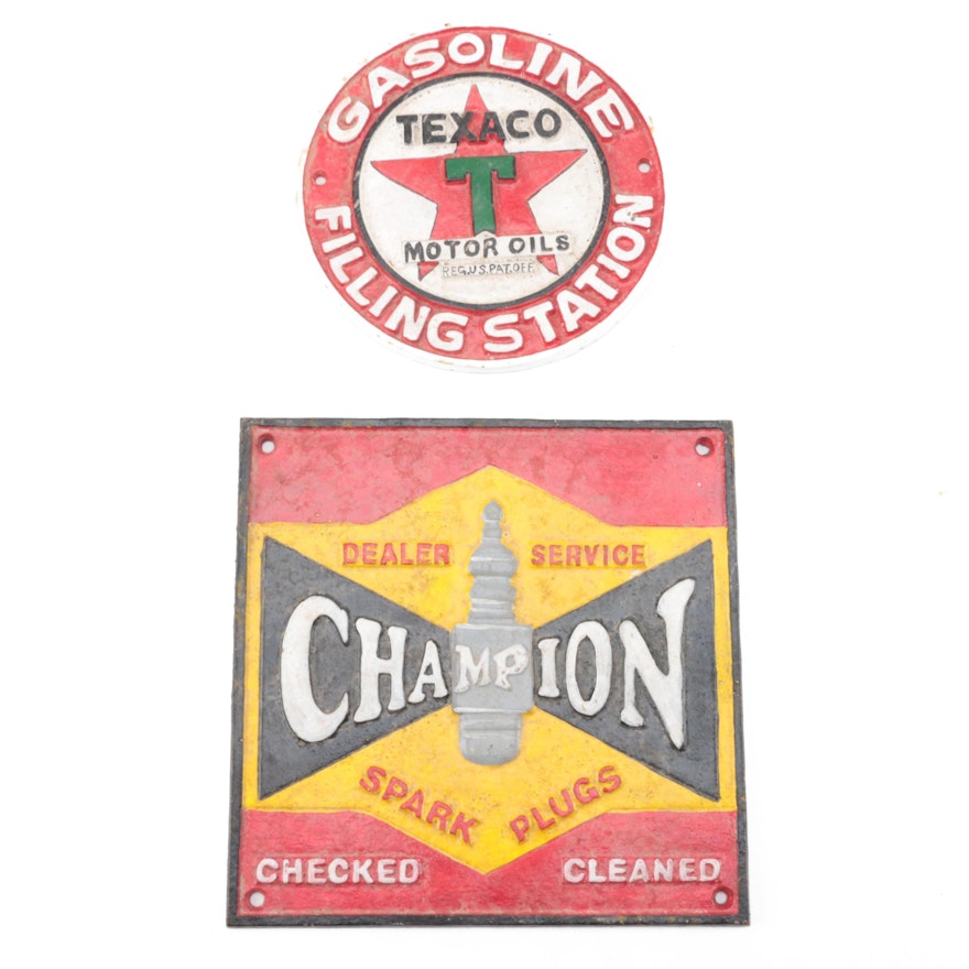 Champion Spark Plugs and Texaco Motor Oil Cast Iron Signs