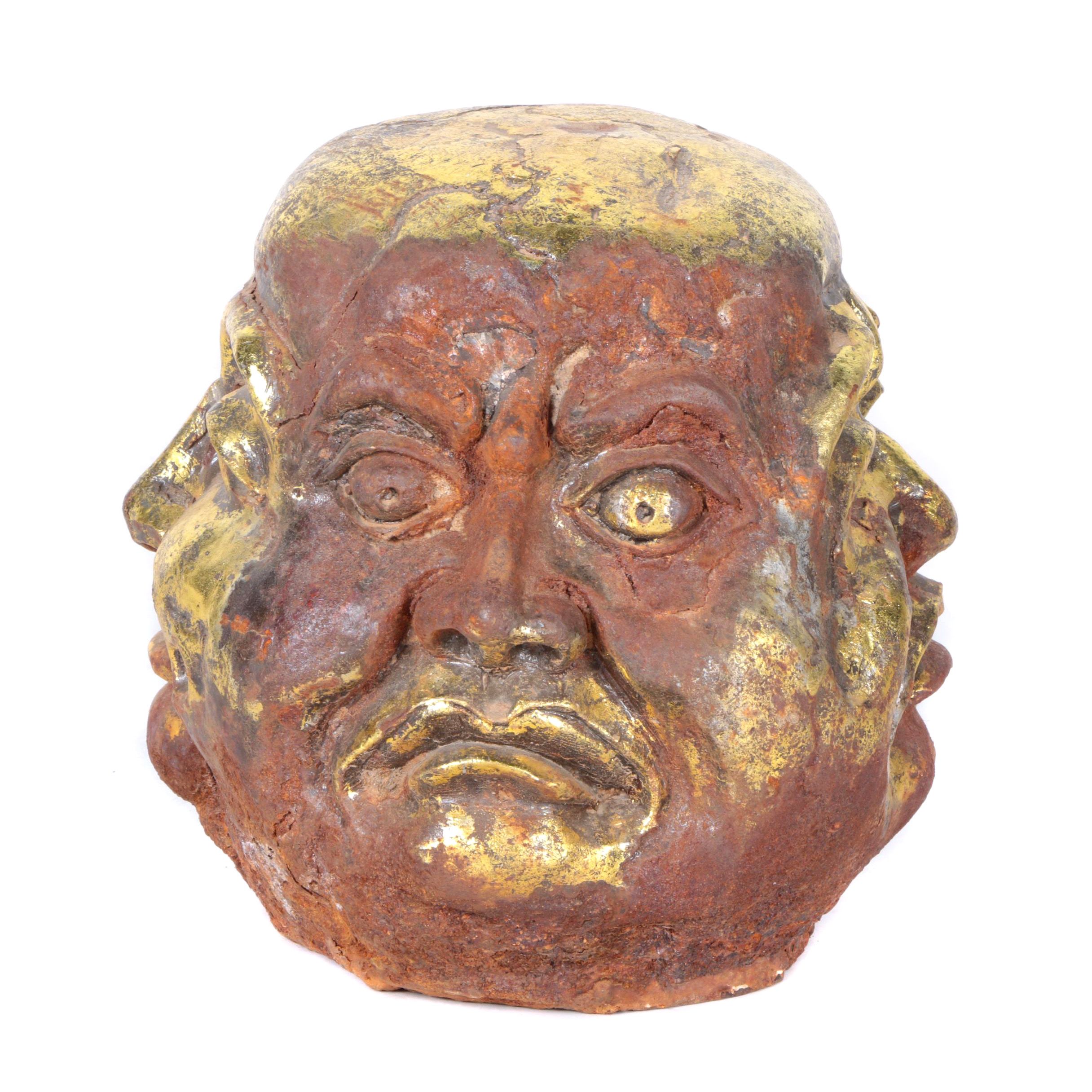 Sculpture of Head with Four Faces