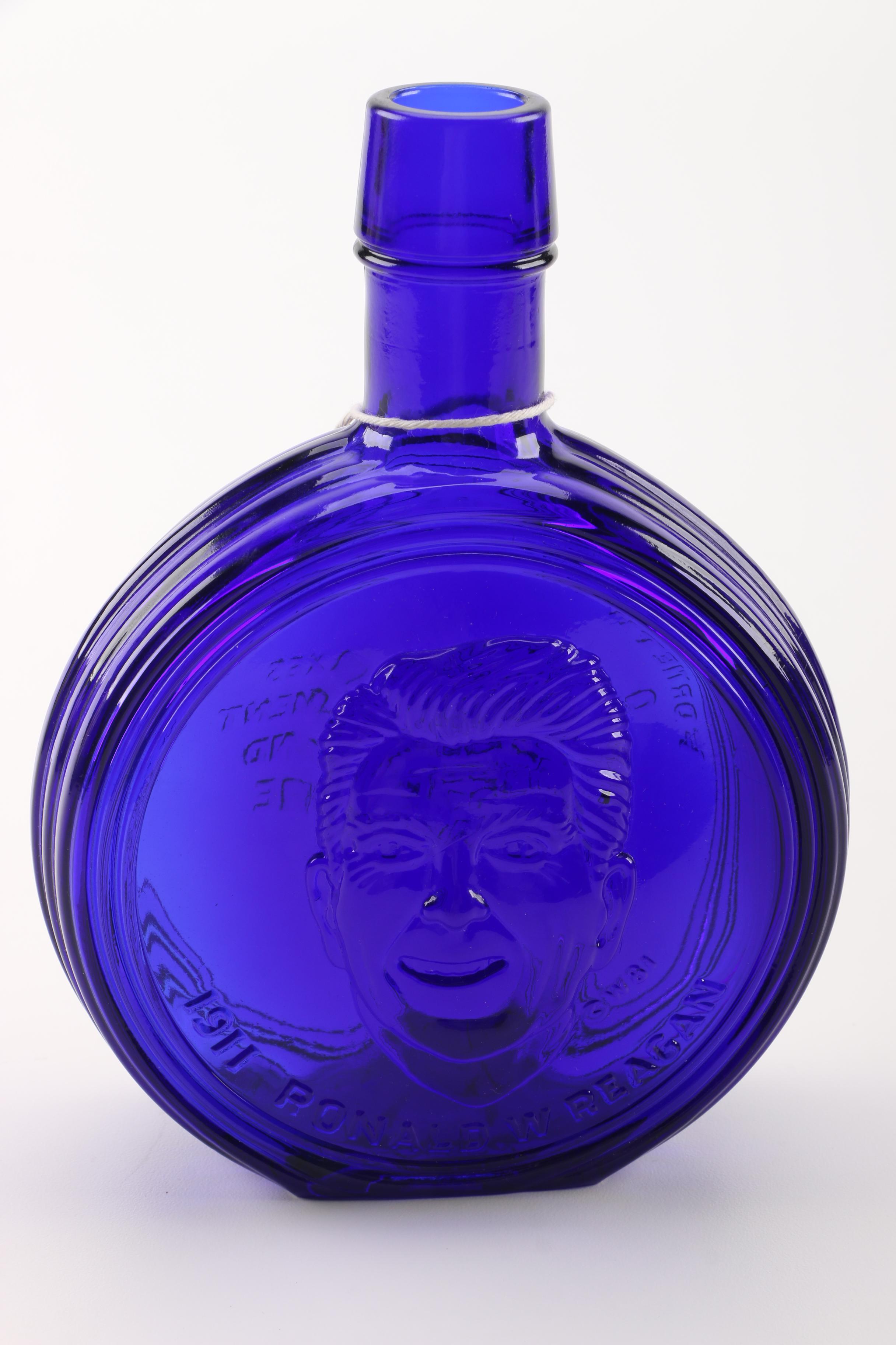 Ronald Reagan Blue Glass Bottle with Souvenir Inaugural License Plates