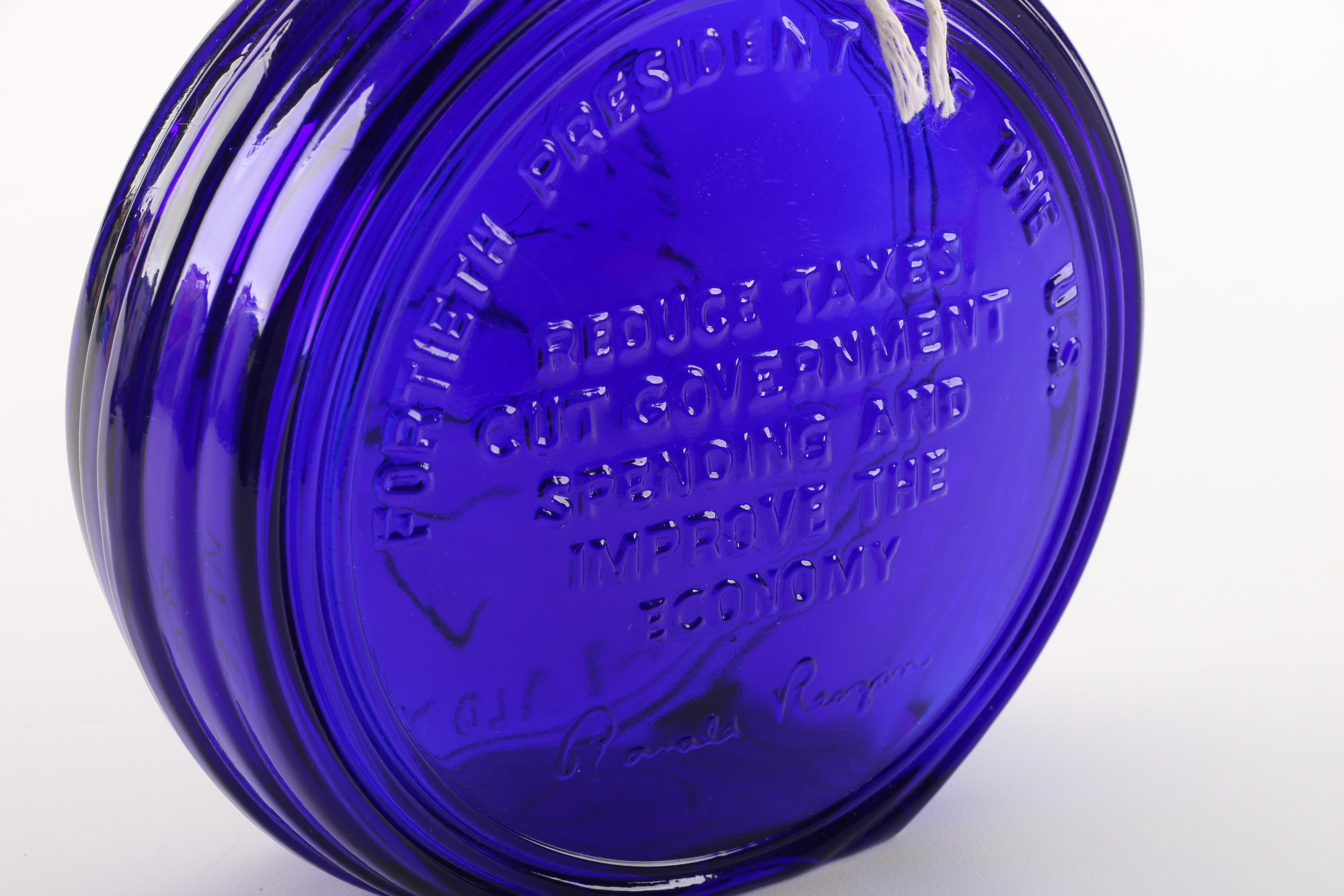 Ronald Reagan Blue Glass Bottle with Souvenir Inaugural License Plates