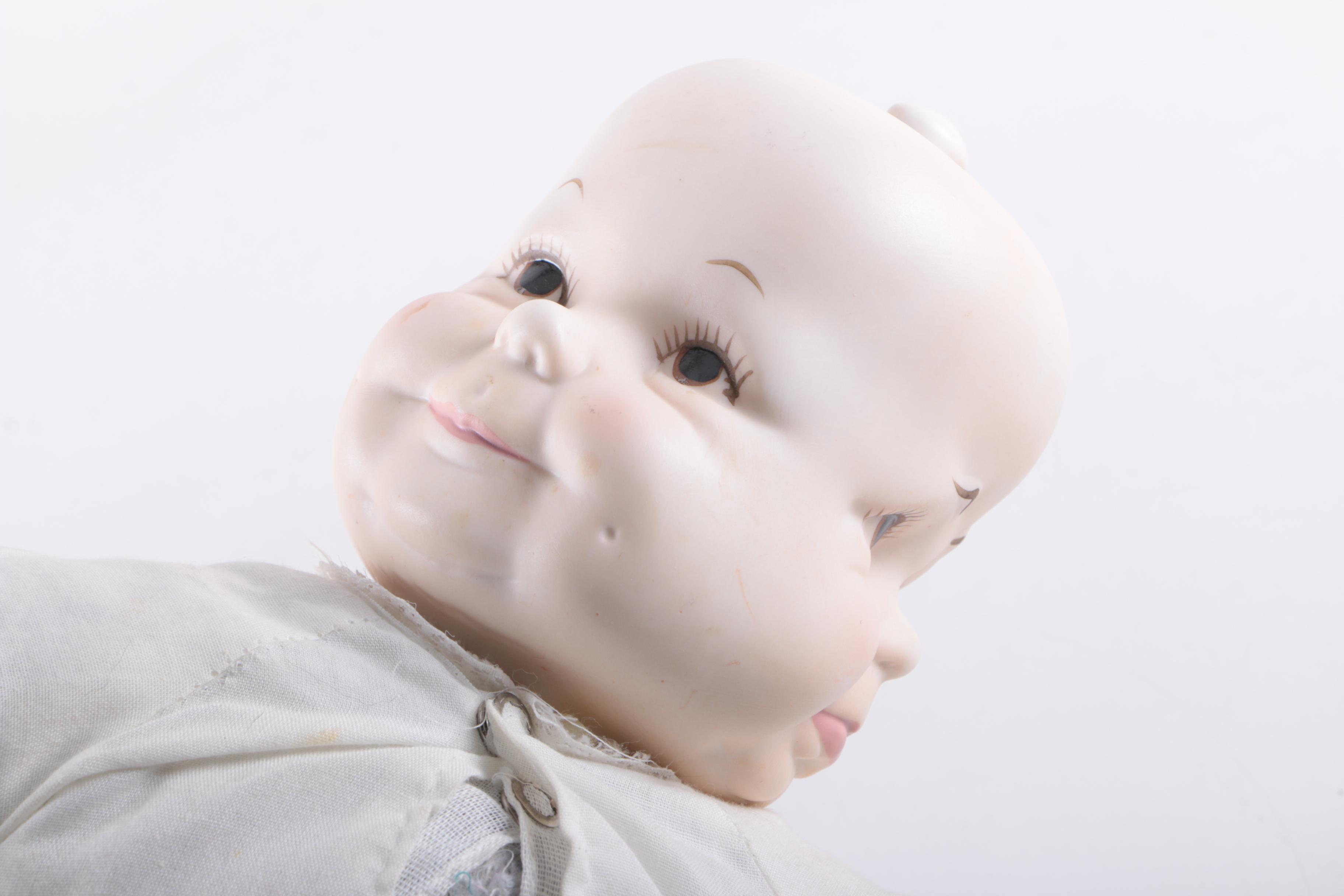 Vintage Three Face Bisque Head Kit Doll with Baby Doll in Bassinet