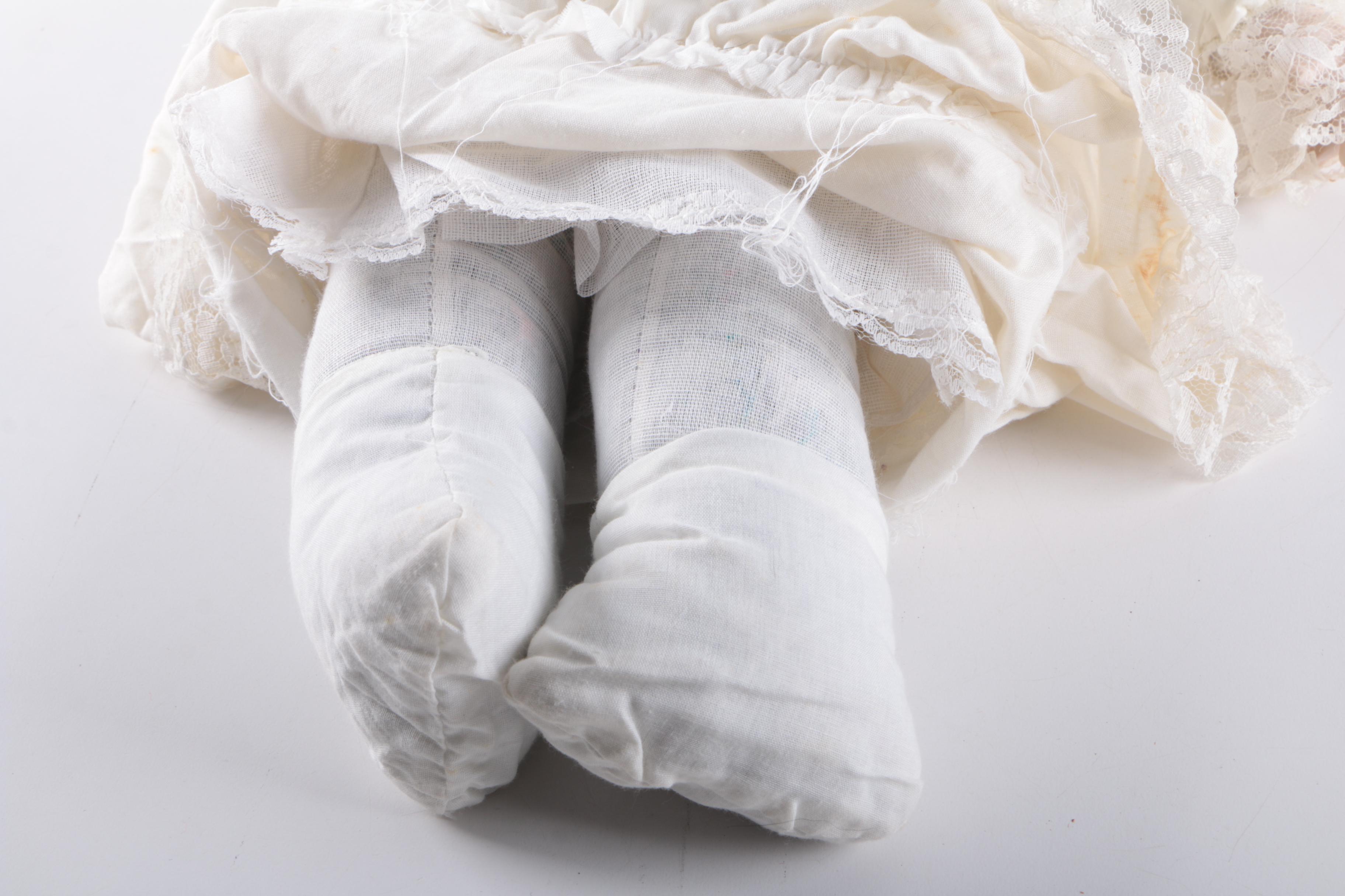 Vintage Three Face Bisque Head Kit Doll with Baby Doll in Bassinet