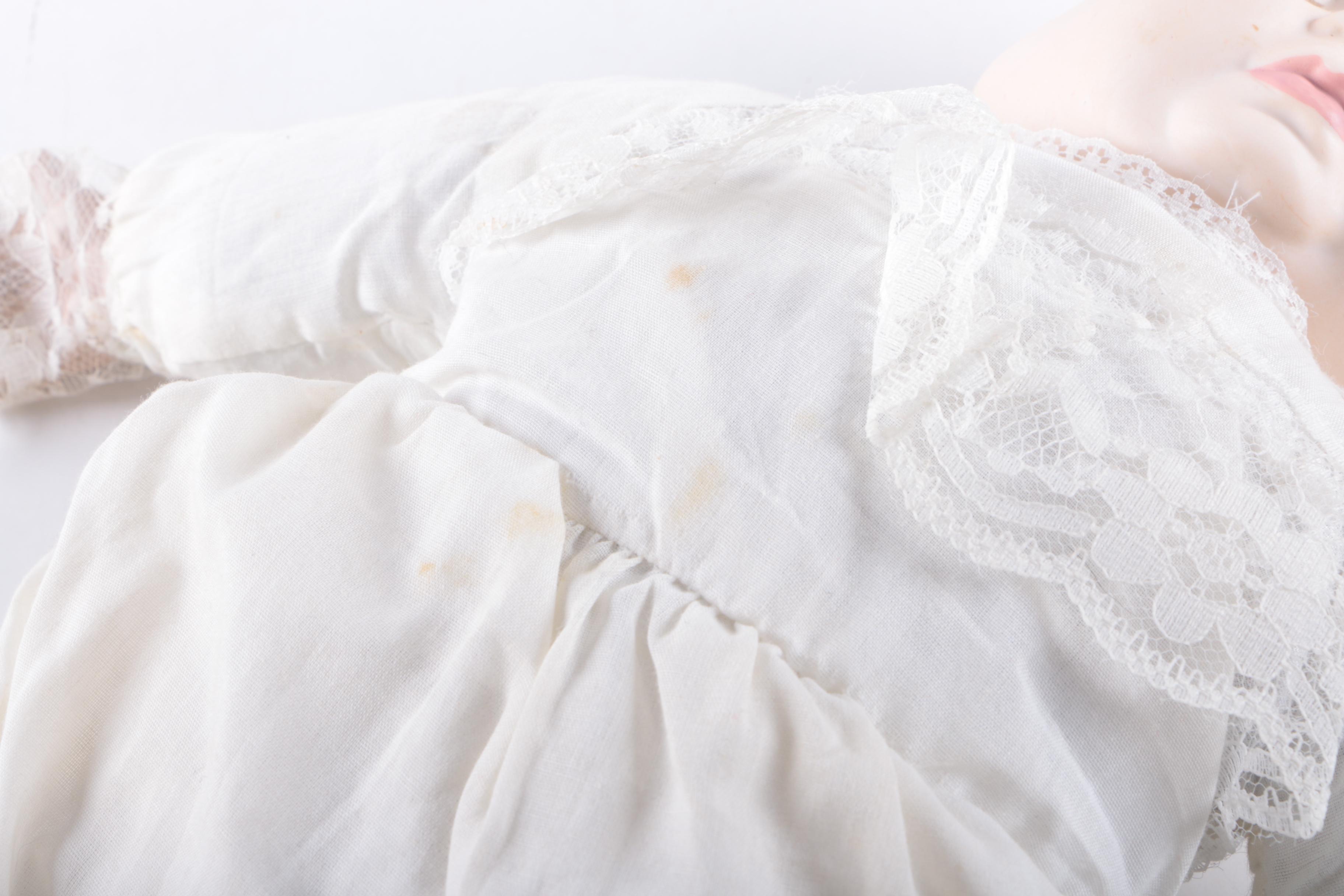 Vintage Three Face Bisque Head Kit Doll with Baby Doll in Bassinet