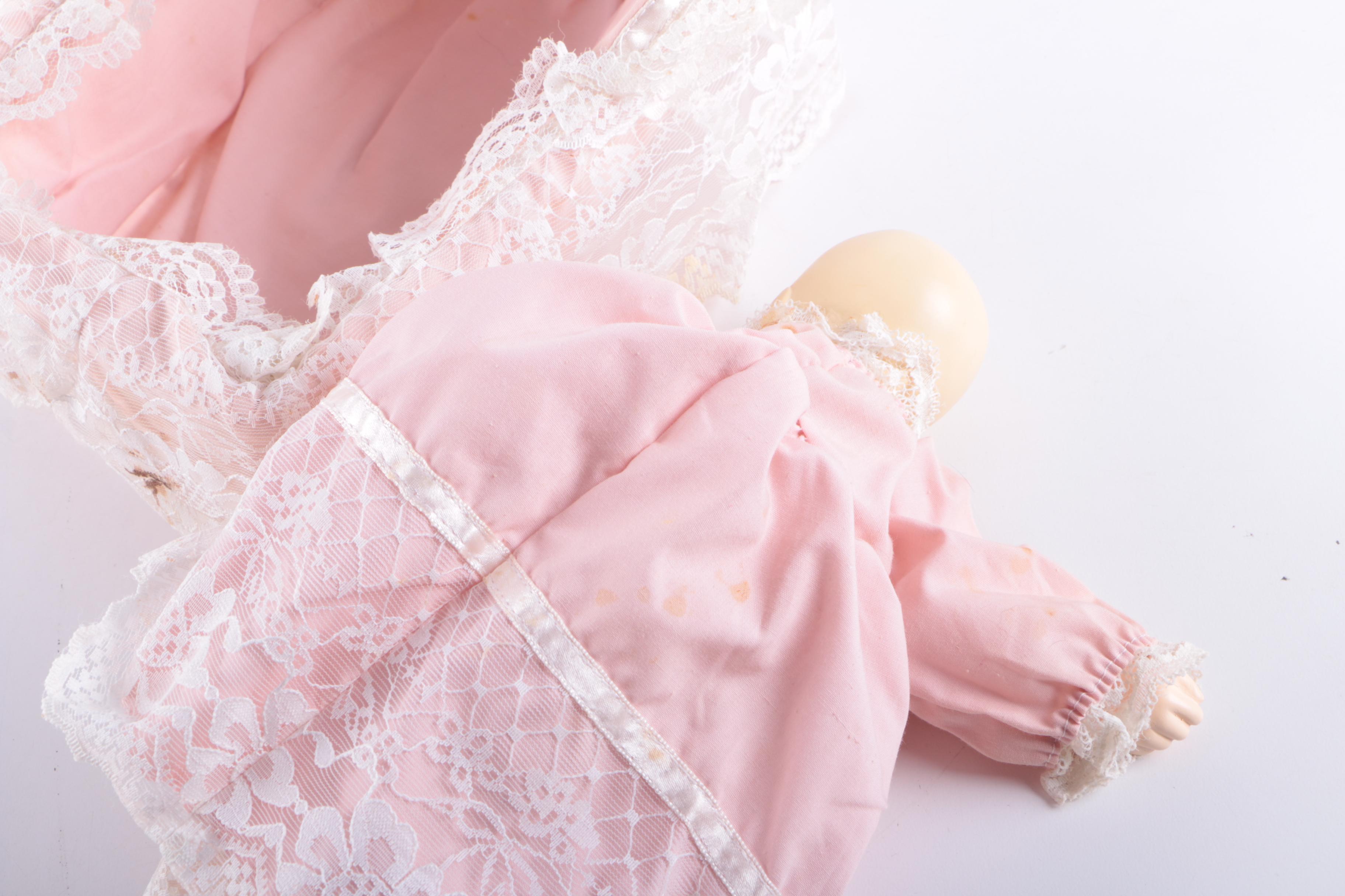 Vintage Three Face Bisque Head Kit Doll with Baby Doll in Bassinet