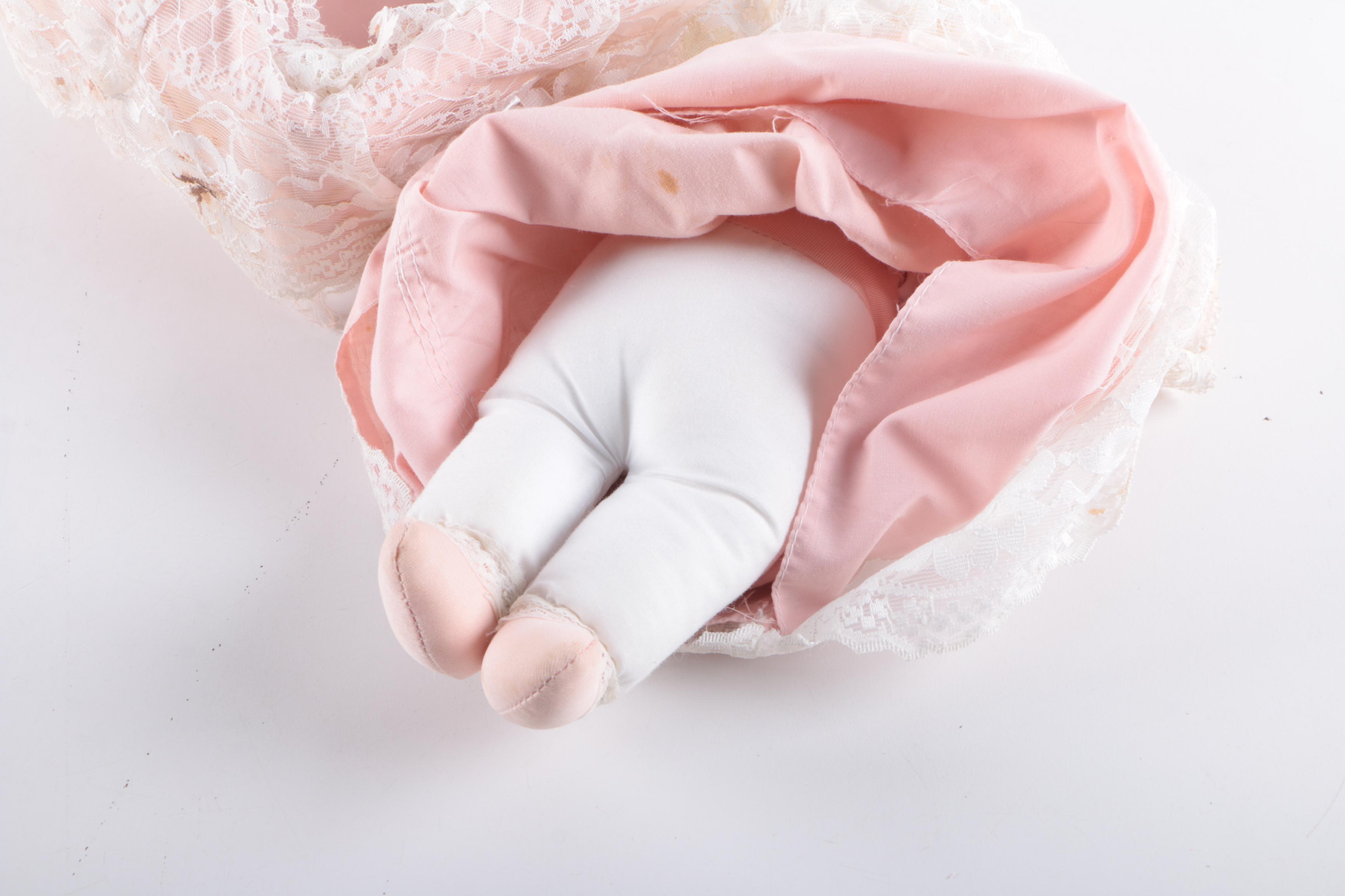 Vintage Three Face Bisque Head Kit Doll with Baby Doll in Bassinet