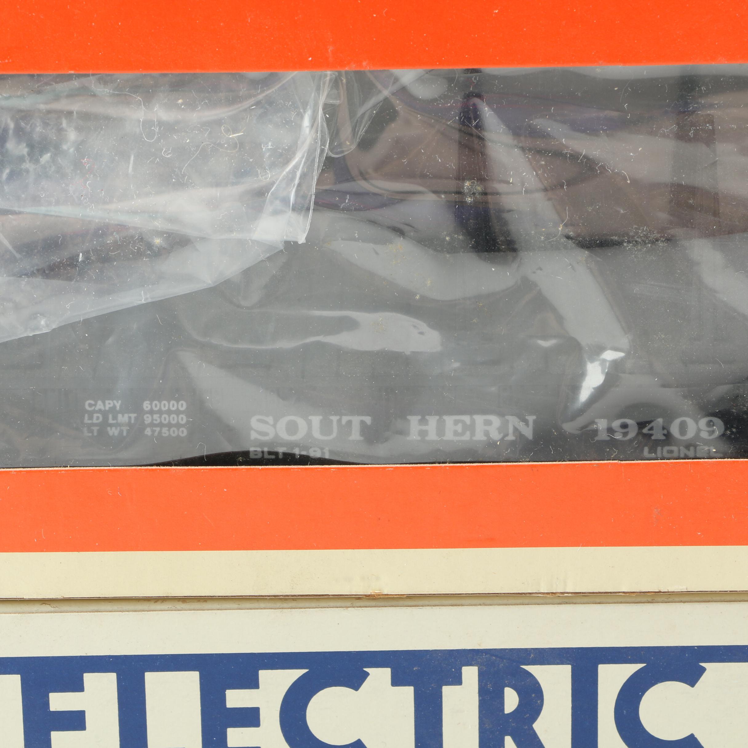 Lionel Train Cars Including Flat Car with Tractors