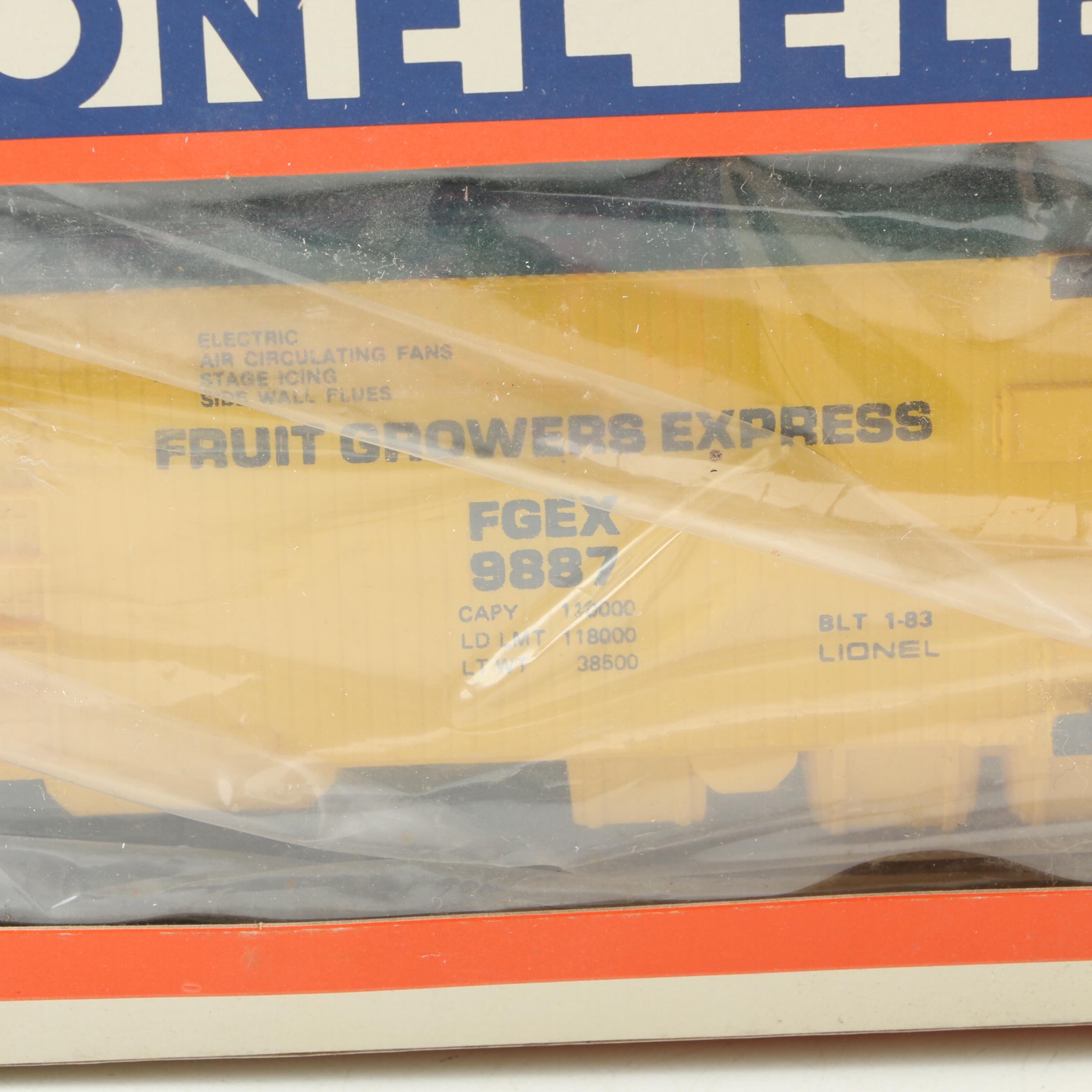 Lionel Train Cars Including Flat Car with Tractors