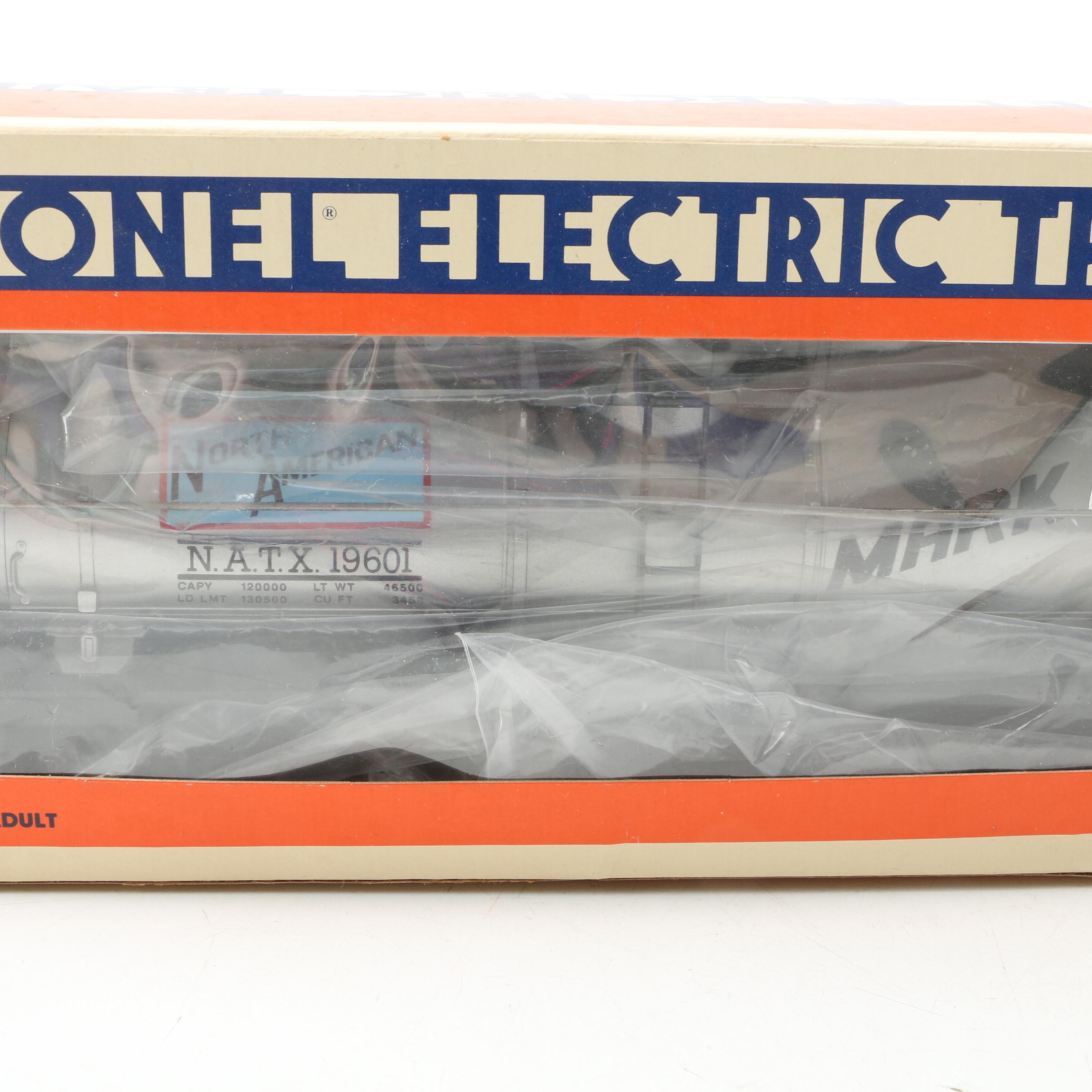 Lionel Train Cars Including Flat Car with Tractors