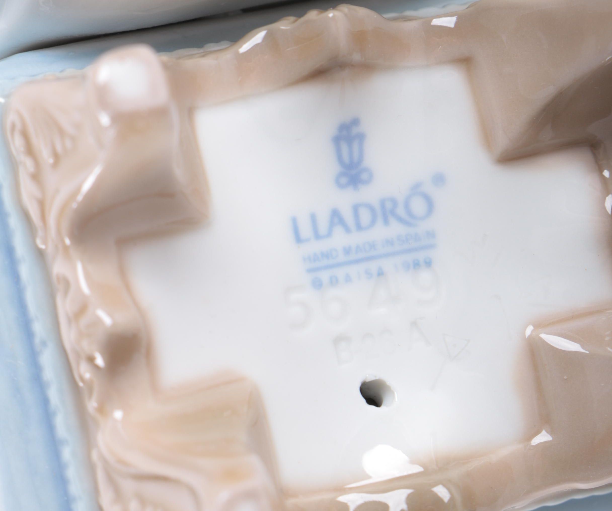 Lladró Porcelain Segovia Clock and Retired "Nothing To Do" Figurine