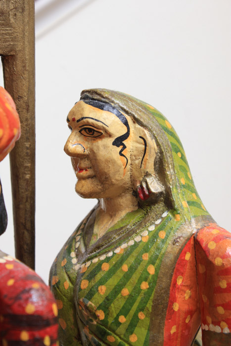 Indian Inspired Polychrome Wooden Sculpture of Figures Riding a Camel