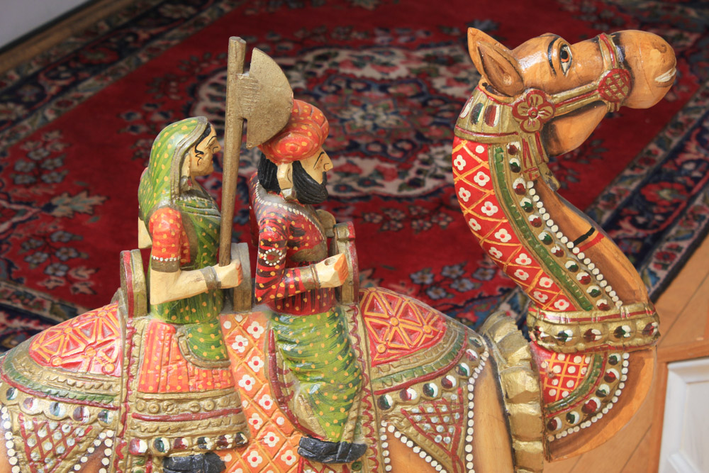 Indian Inspired Polychrome Wooden Sculpture of Figures Riding a Camel