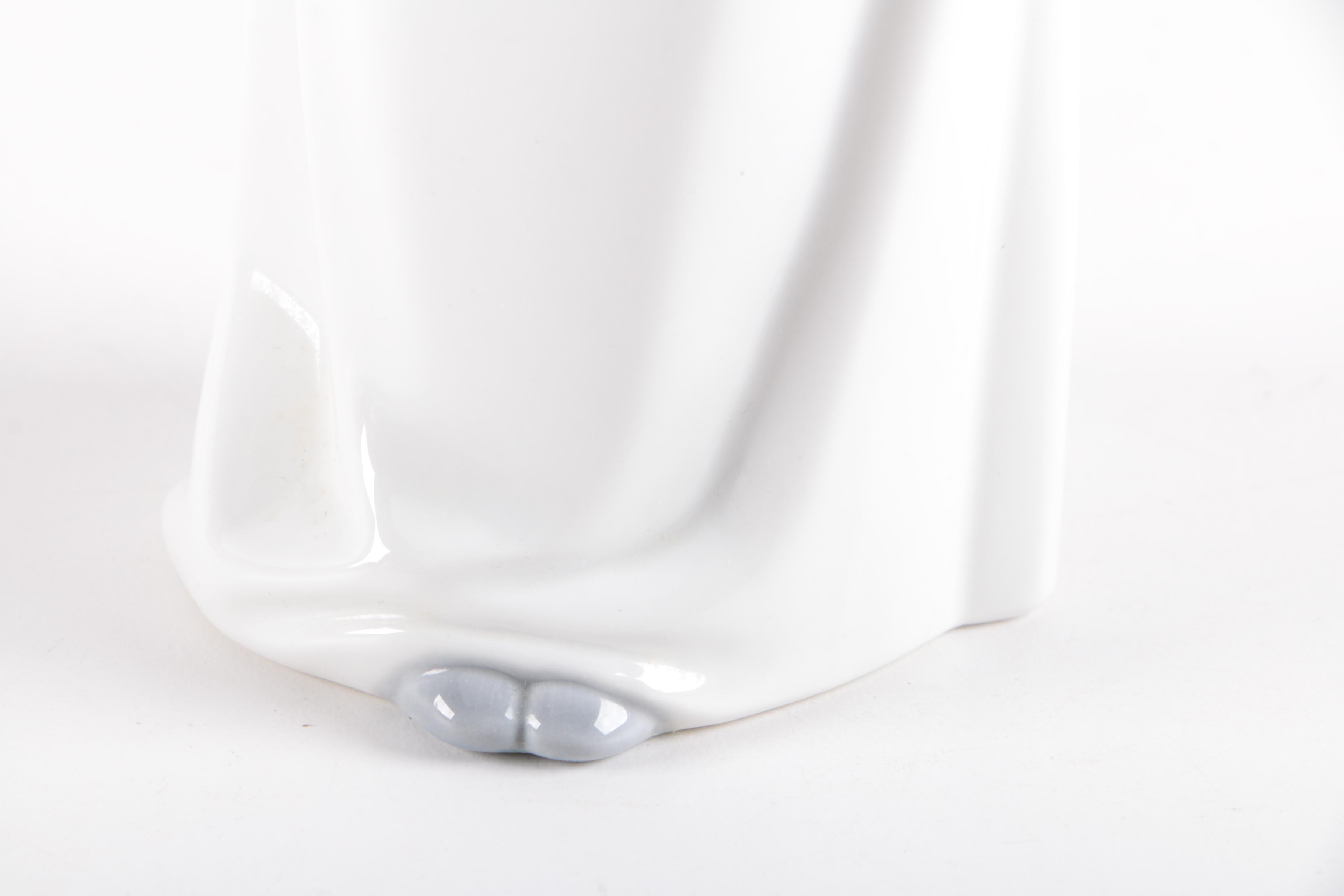 NAO by Lladró "Girl with Doll" Figurine