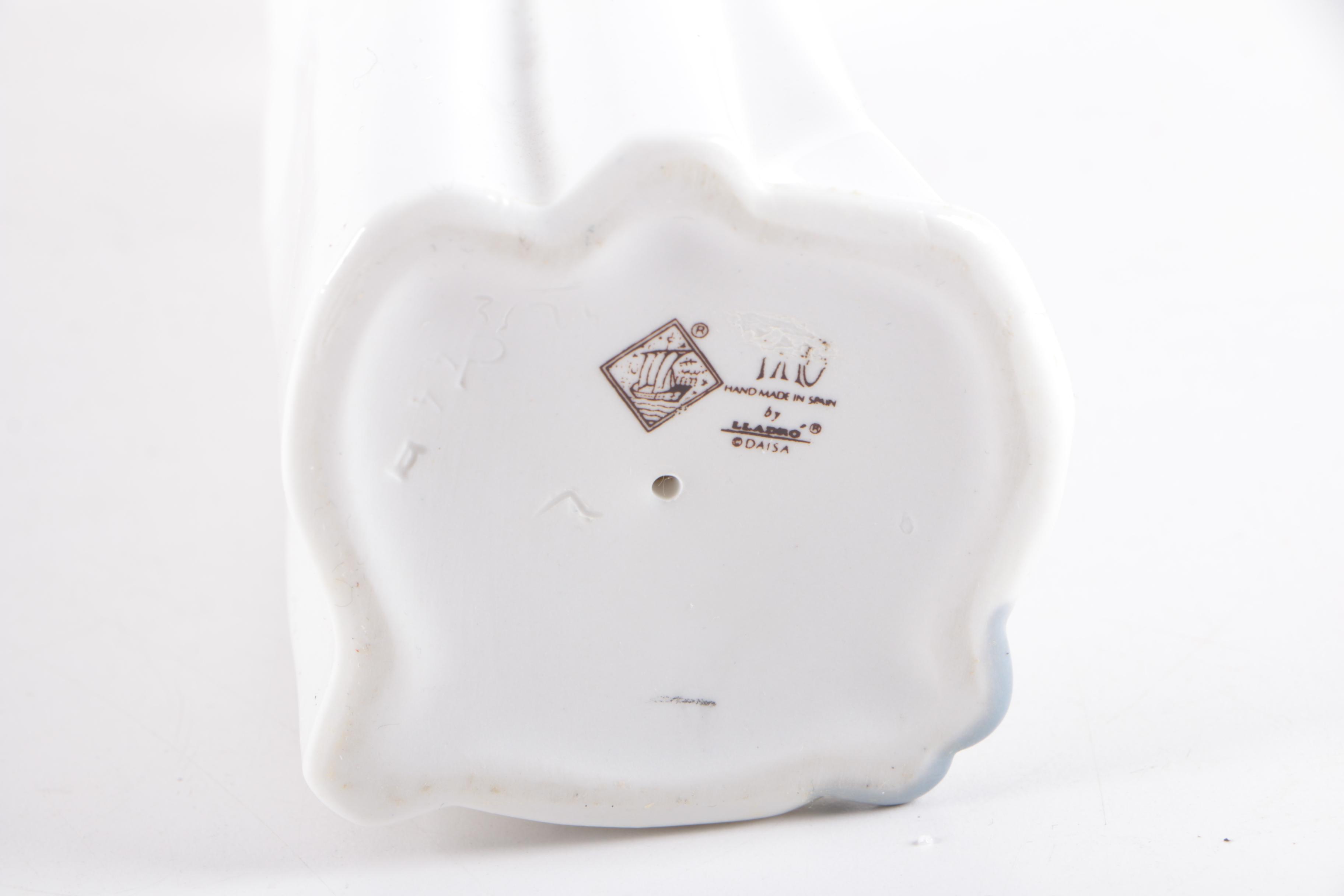 NAO by Lladró "Girl with Doll" Figurine