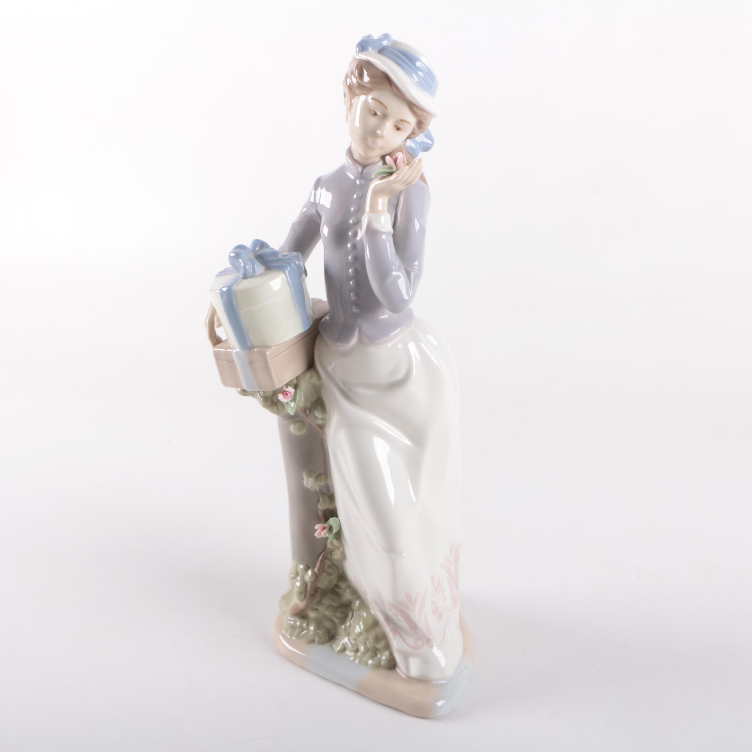 Nadal Woman with Gifts Porcelain Figurine