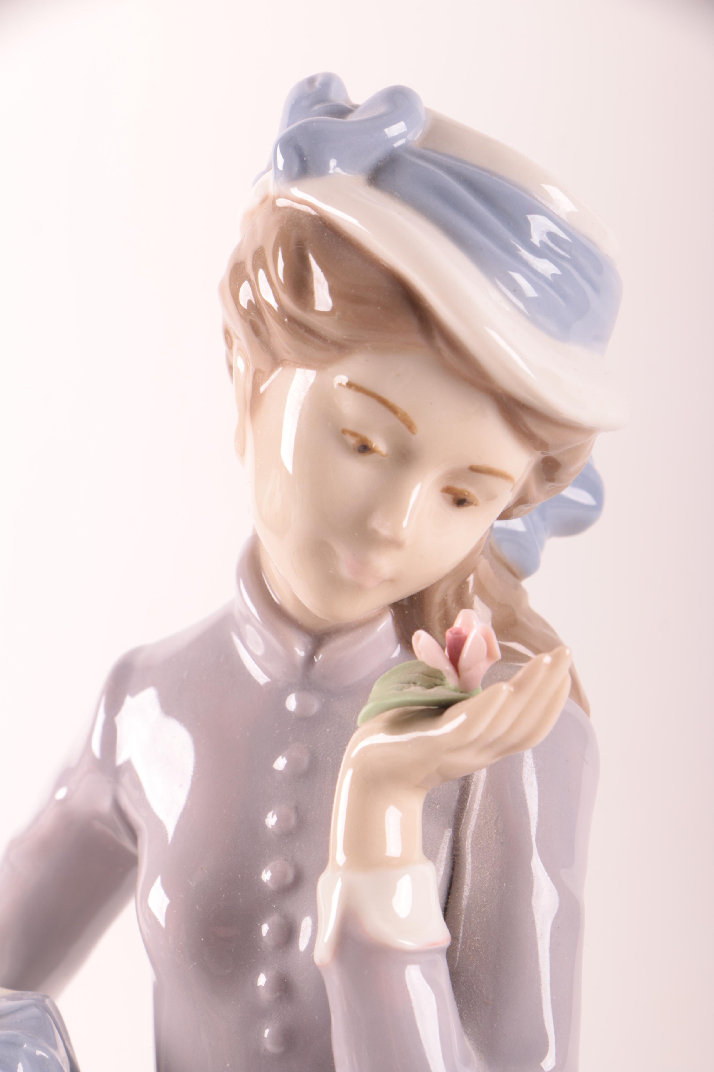 Nadal Woman with Gifts Porcelain Figurine