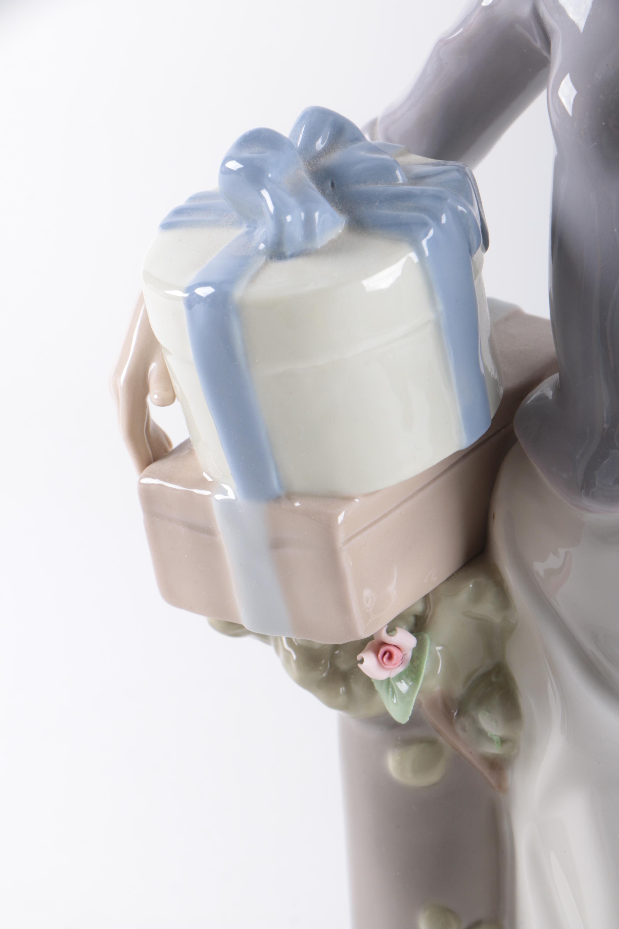 Nadal Woman with Gifts Porcelain Figurine