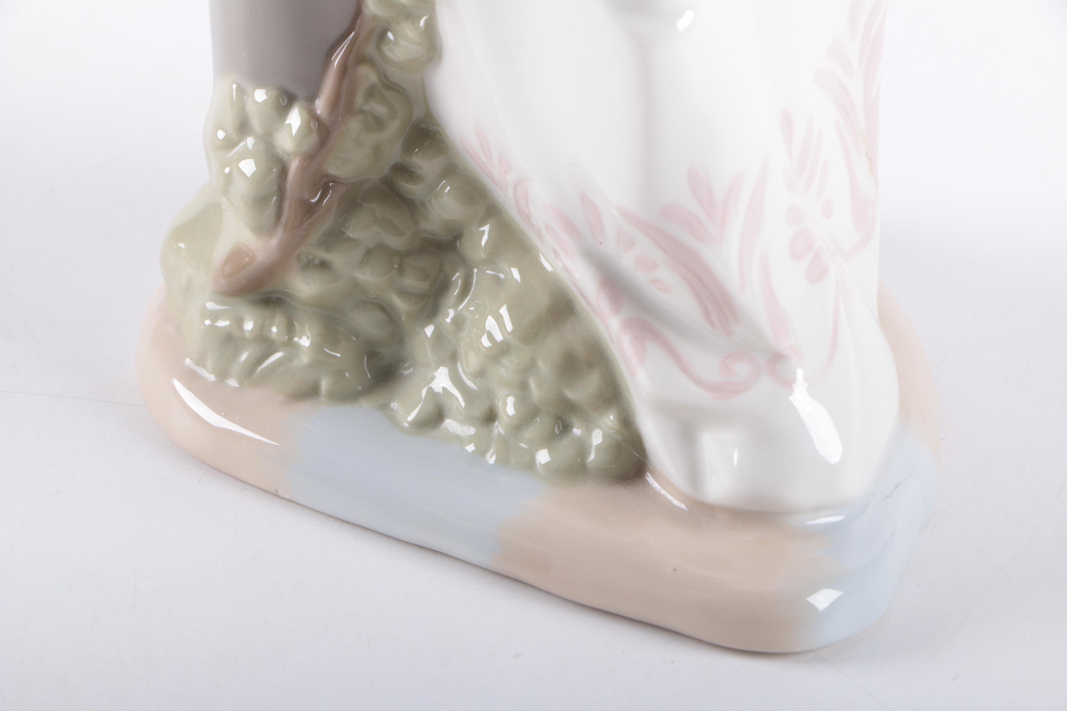 Nadal Woman with Gifts Porcelain Figurine