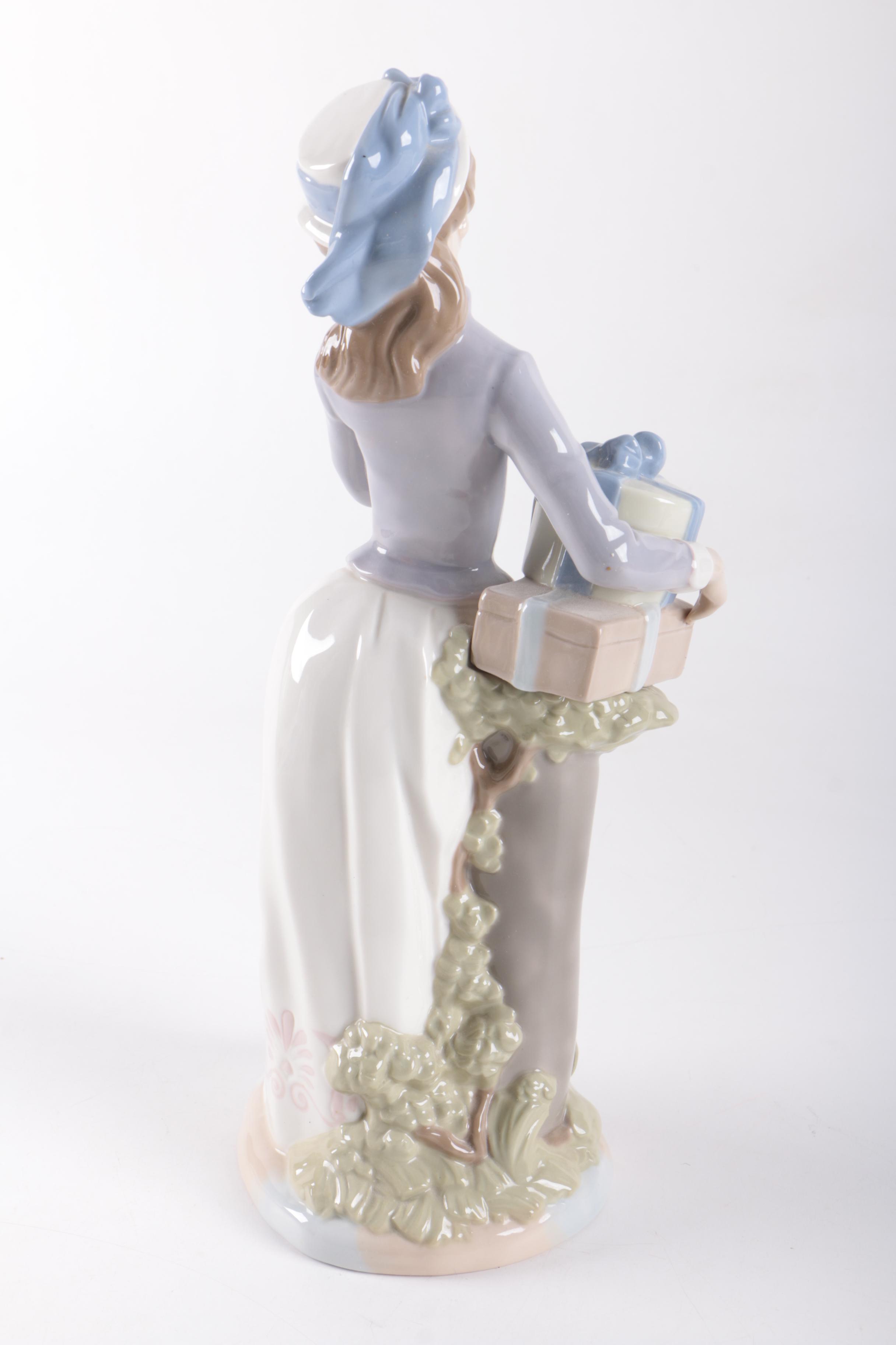 Nadal Woman with Gifts Porcelain Figurine