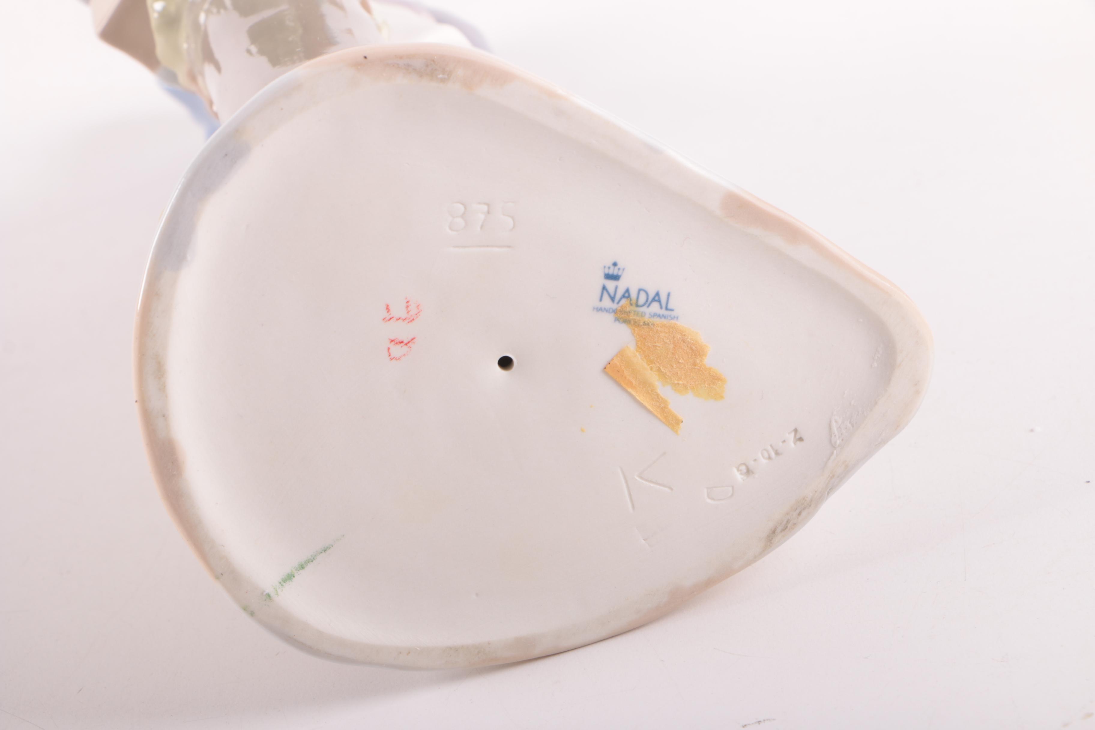 Nadal Woman with Gifts Porcelain Figurine