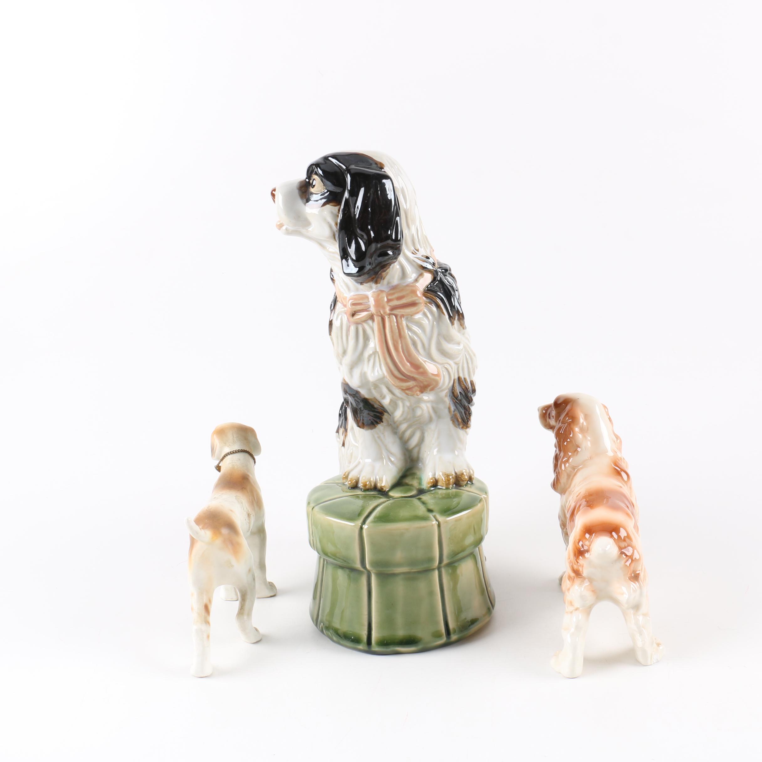 Collection of Three Ceramic Dog Figurines
