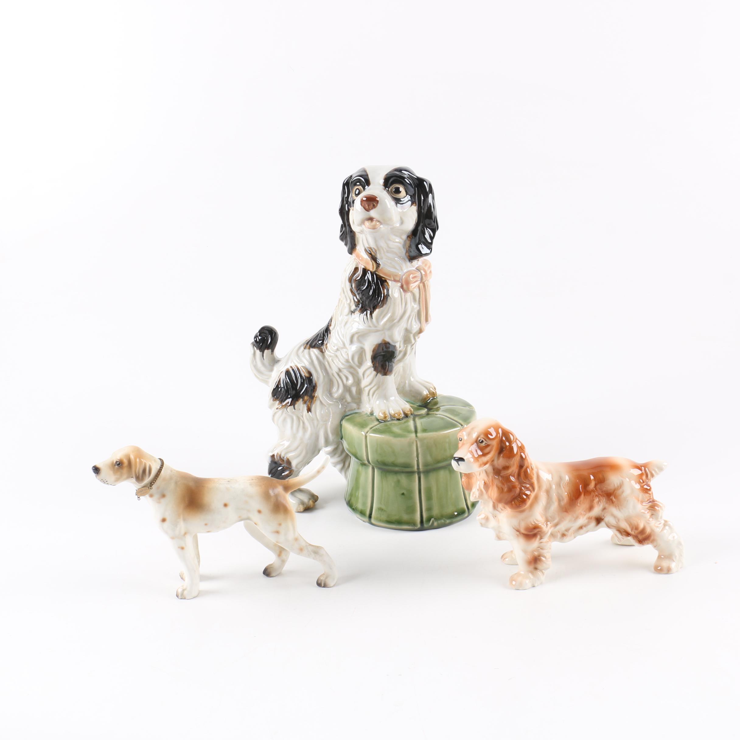 Collection of Three Ceramic Dog Figurines