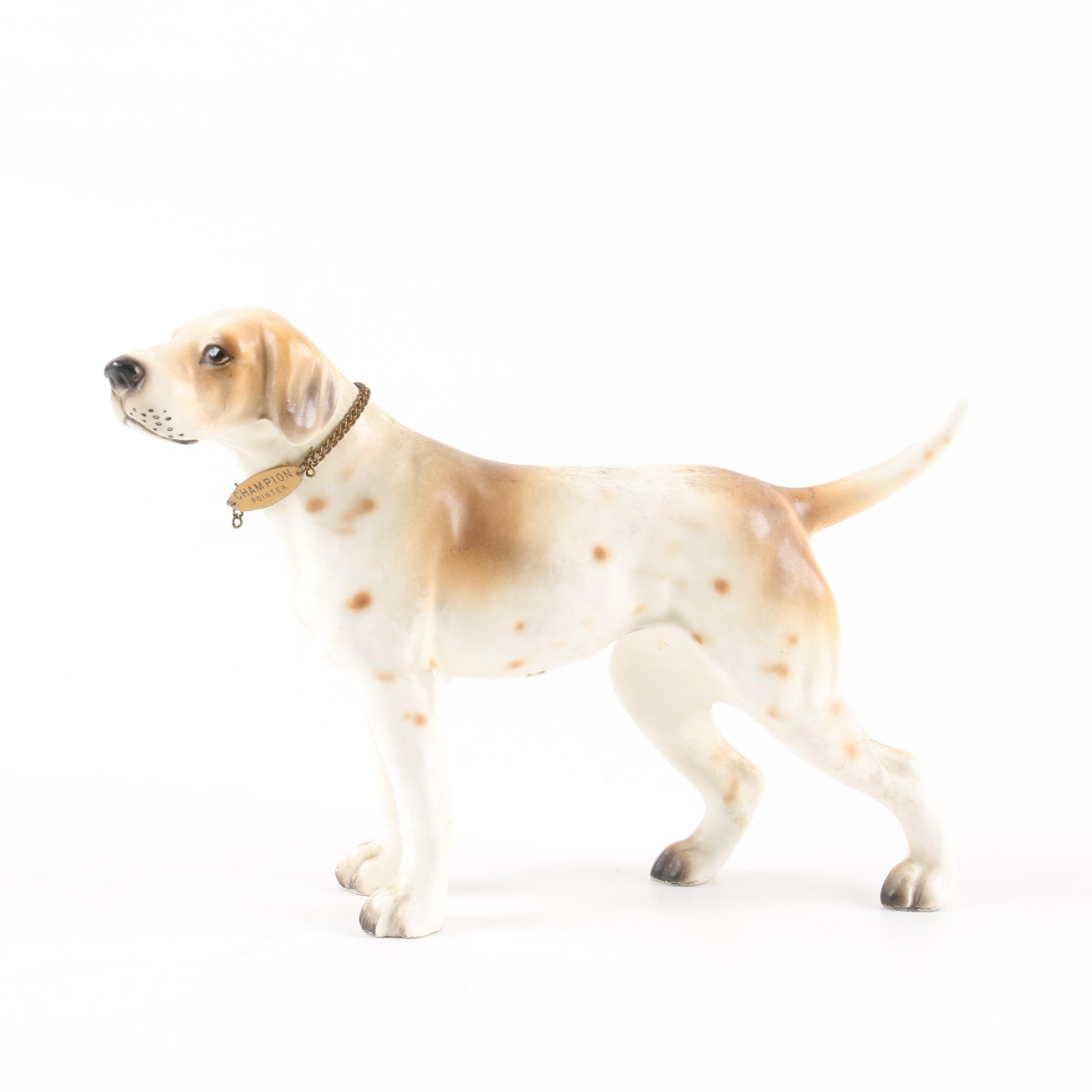 Collection of Three Ceramic Dog Figurines