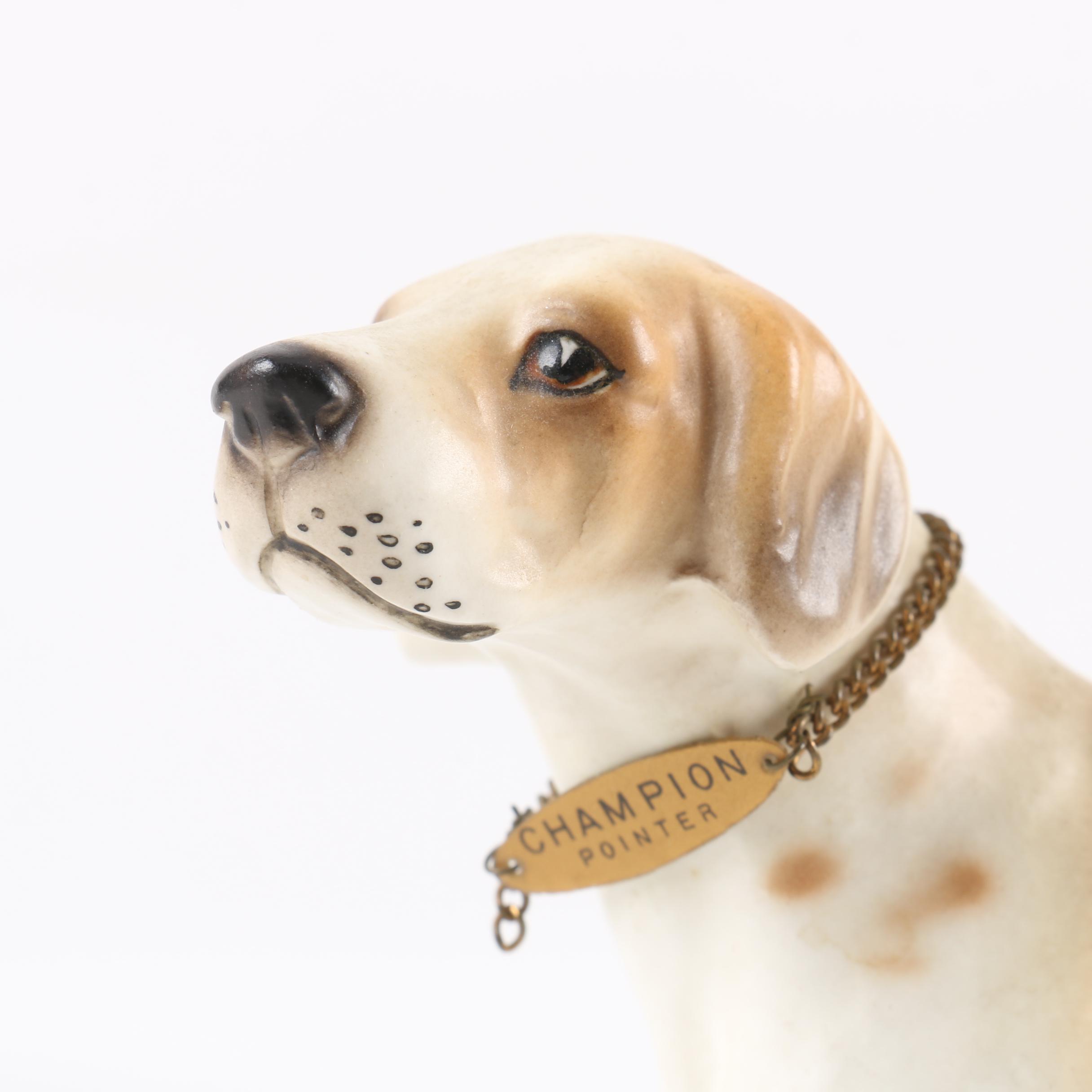 Collection of Three Ceramic Dog Figurines