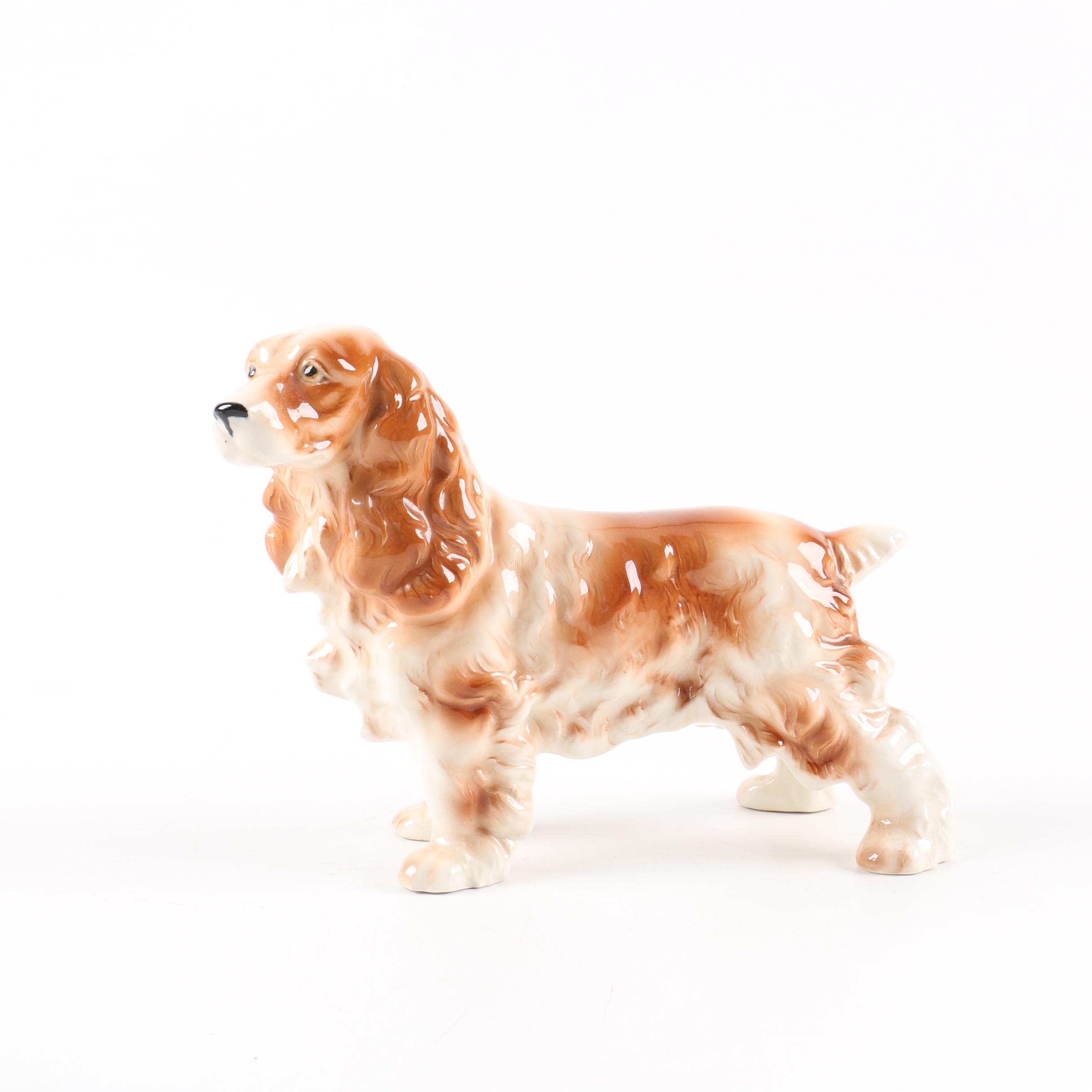 Collection of Three Ceramic Dog Figurines