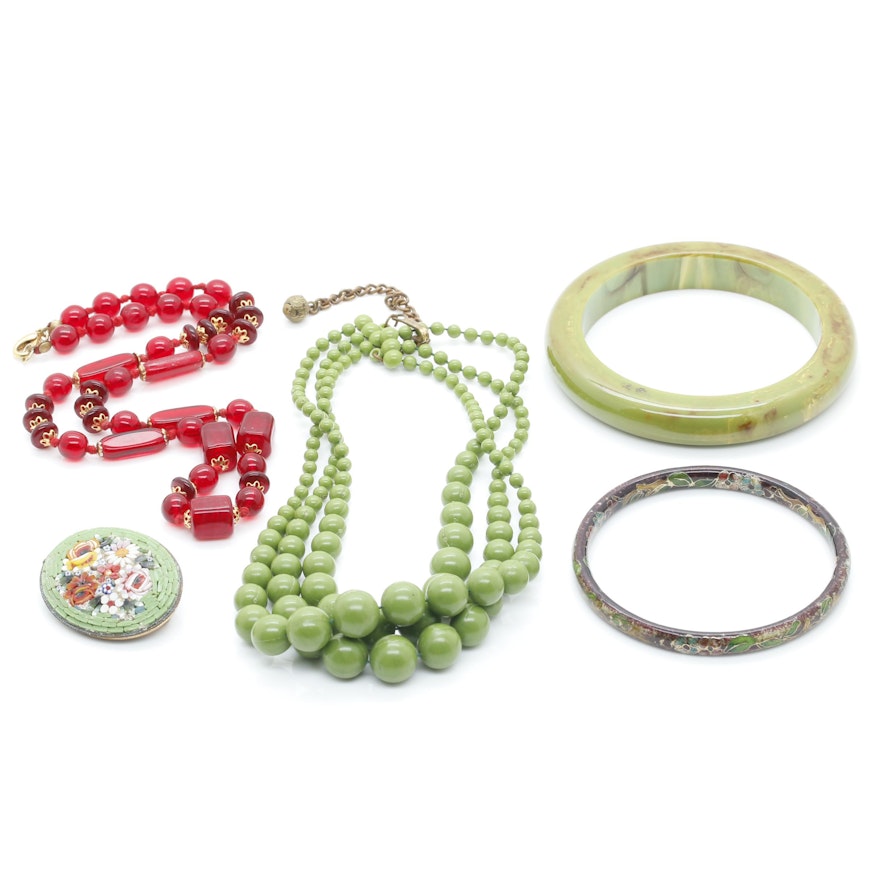 Gold Tone Jewelry Assortment Featuring Bakelite and Glass