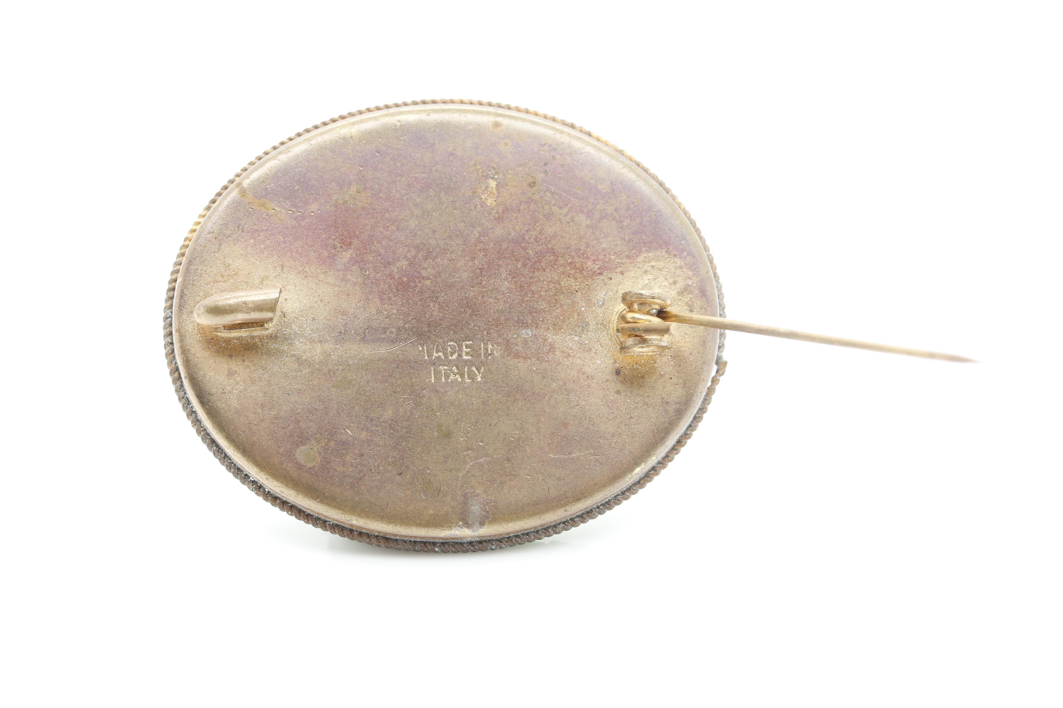 Gold Tone Jewelry Assortment Featuring Bakelite and Glass