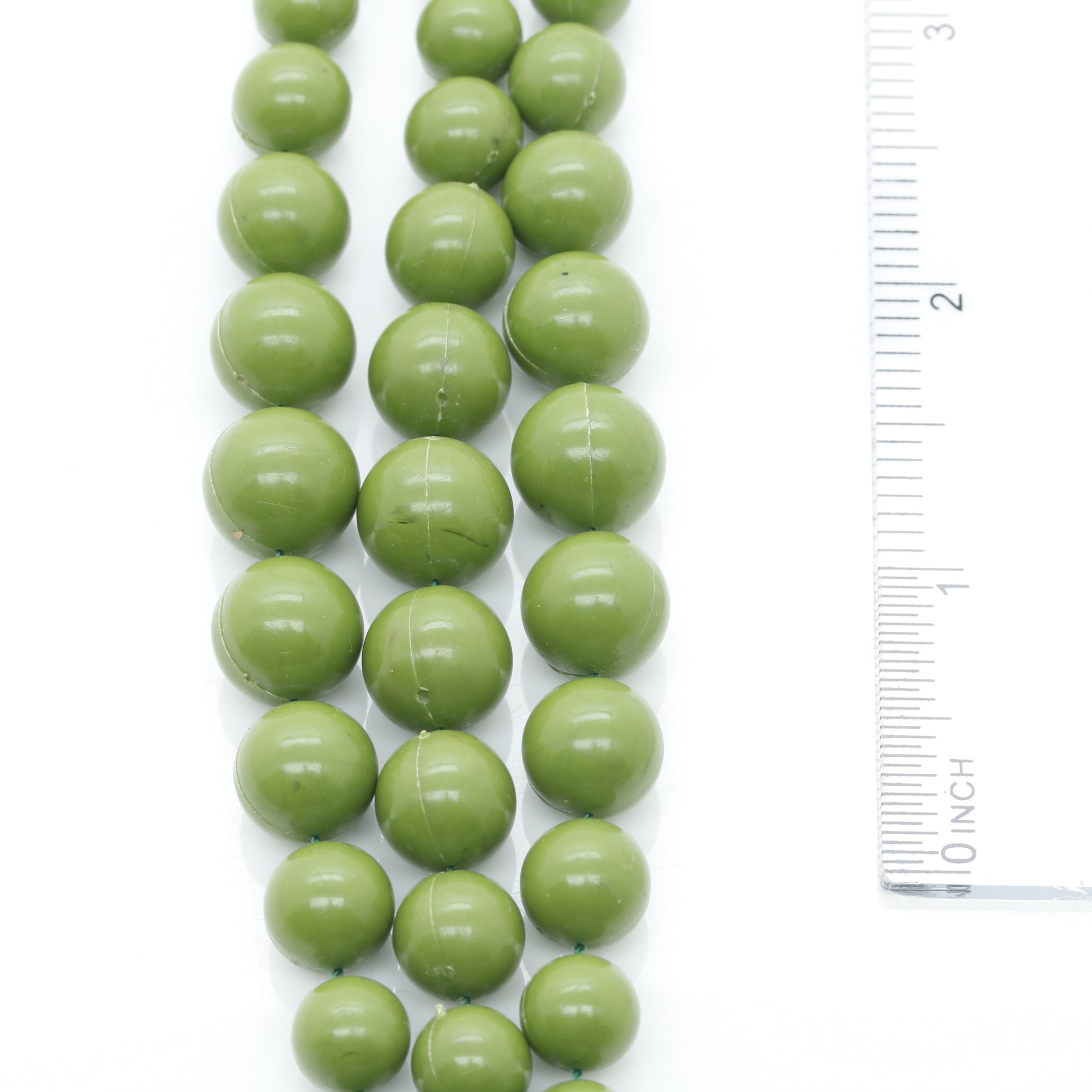 Gold Tone Jewelry Assortment Featuring Bakelite and Glass