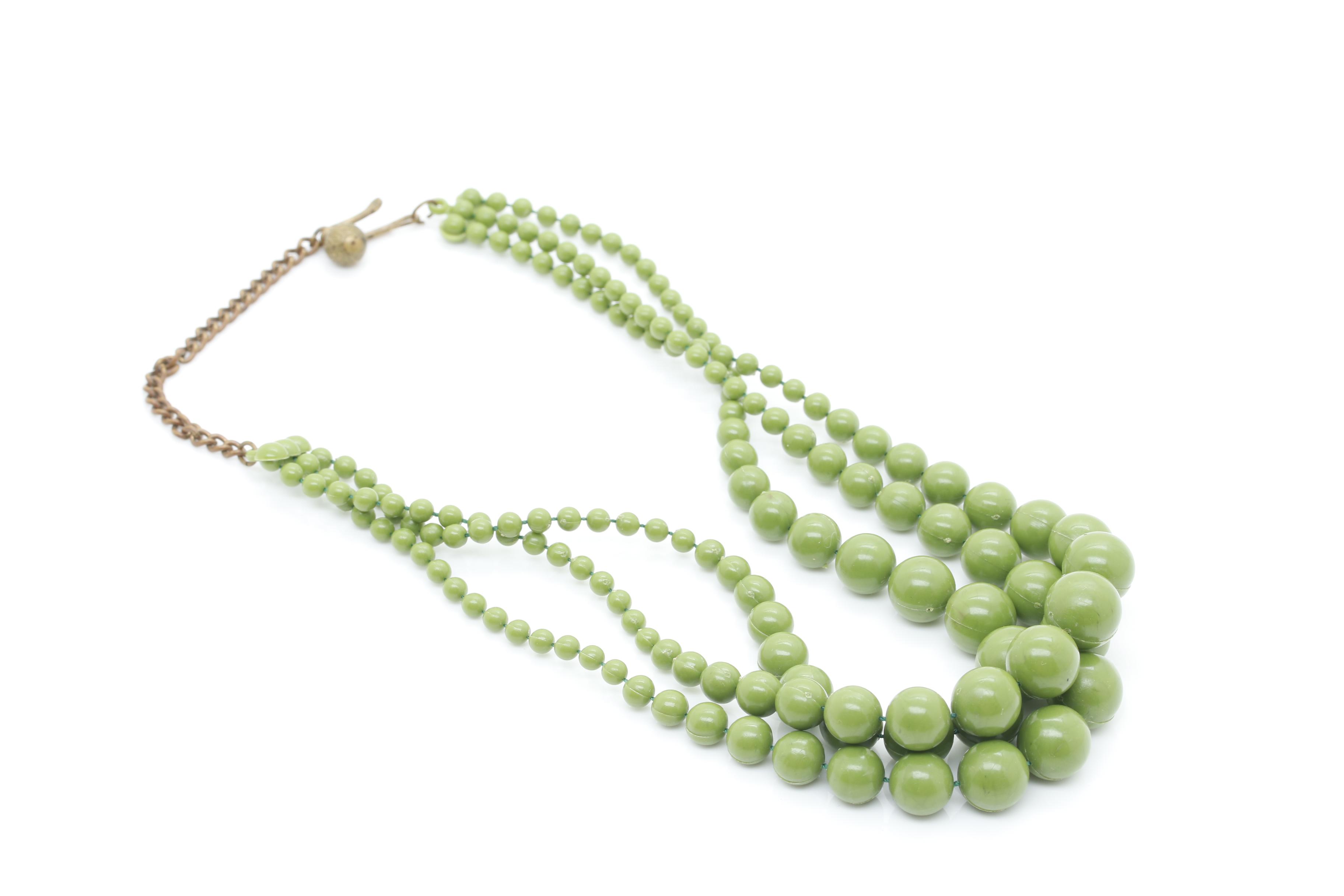 Gold Tone Jewelry Assortment Featuring Bakelite and Glass