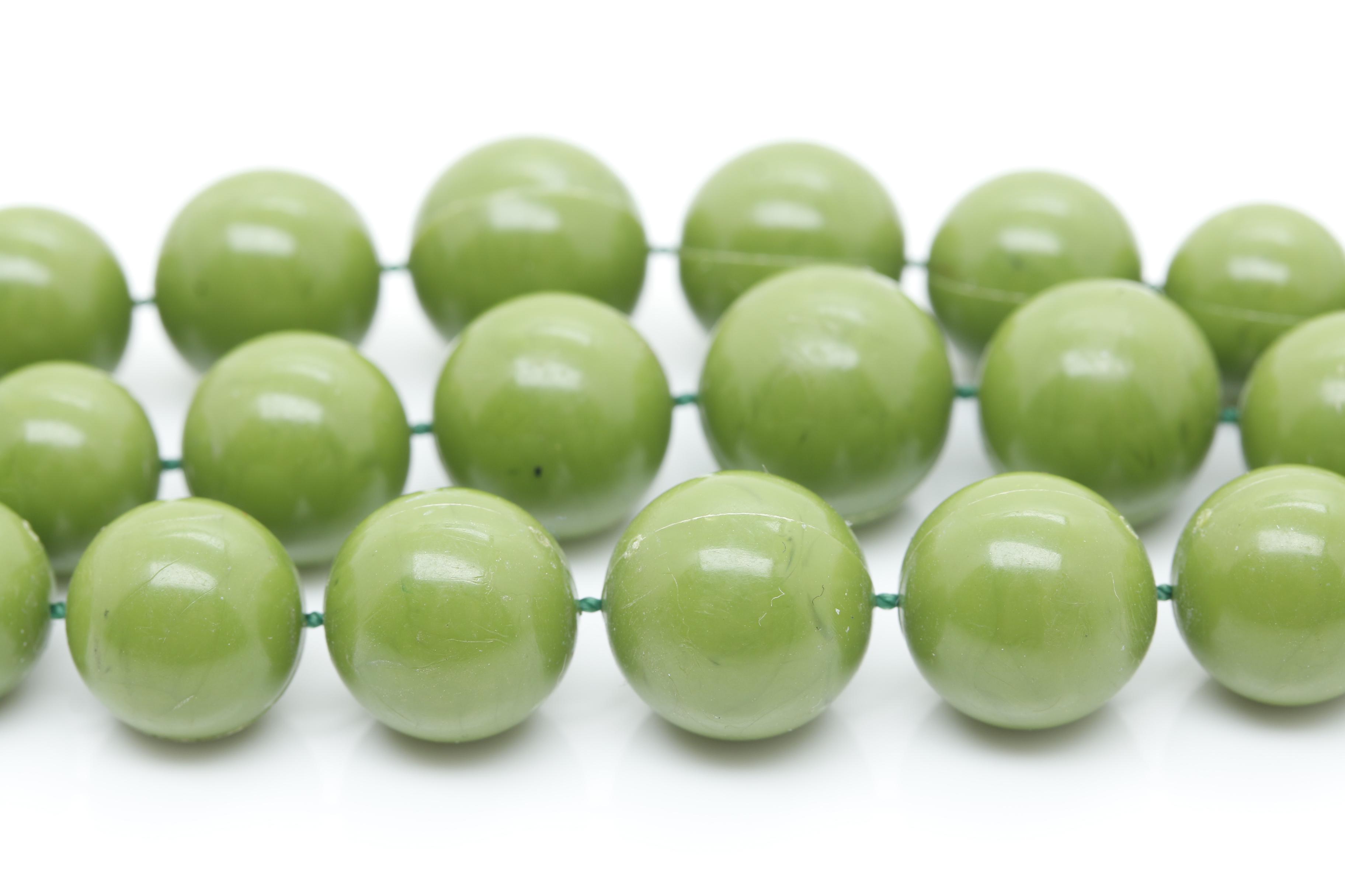 Gold Tone Jewelry Assortment Featuring Bakelite and Glass