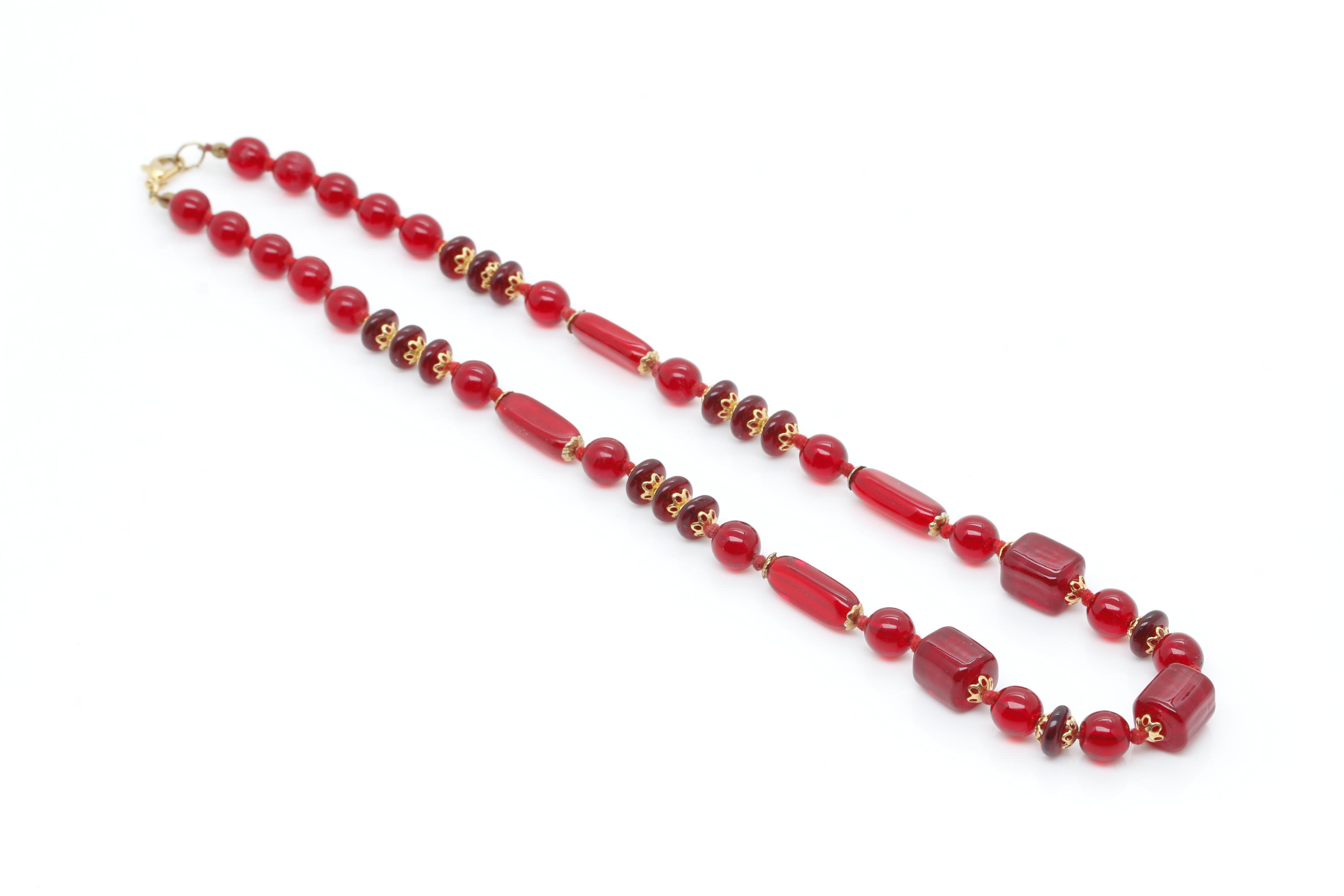 Gold Tone Jewelry Assortment Featuring Bakelite and Glass