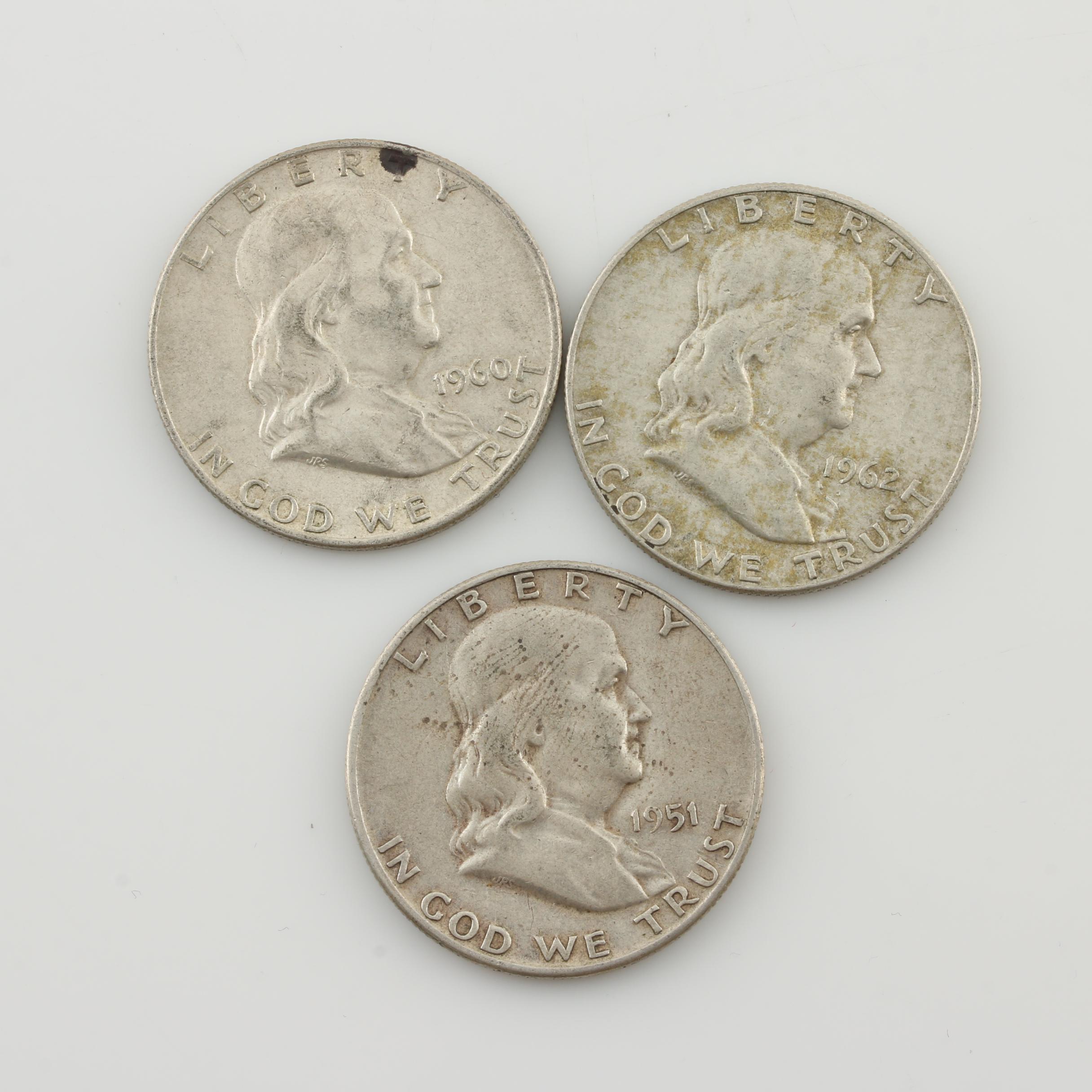 Group of Four Walking Liberty and Three Franklin Silver Half Dollars