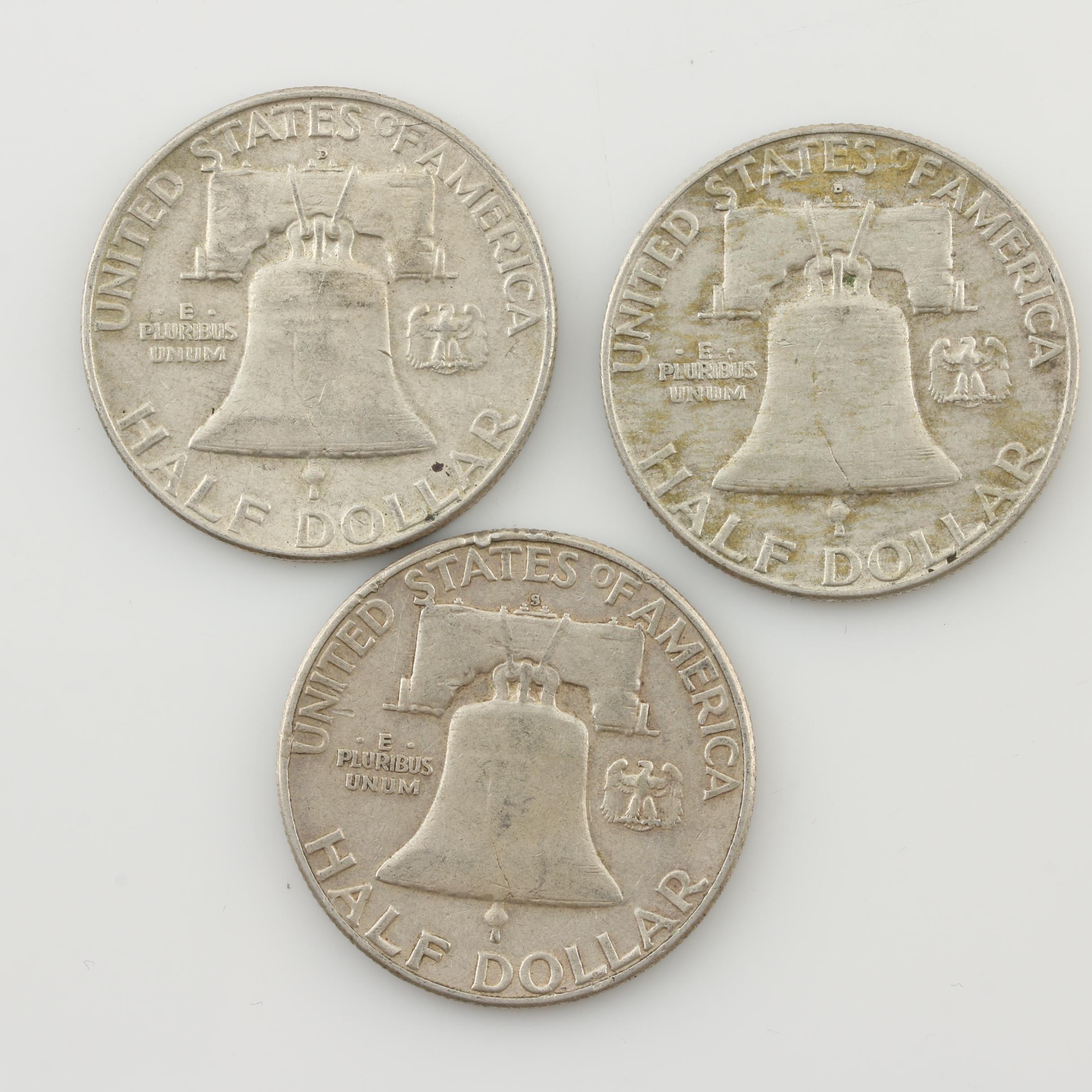 Group of Four Walking Liberty and Three Franklin Silver Half Dollars