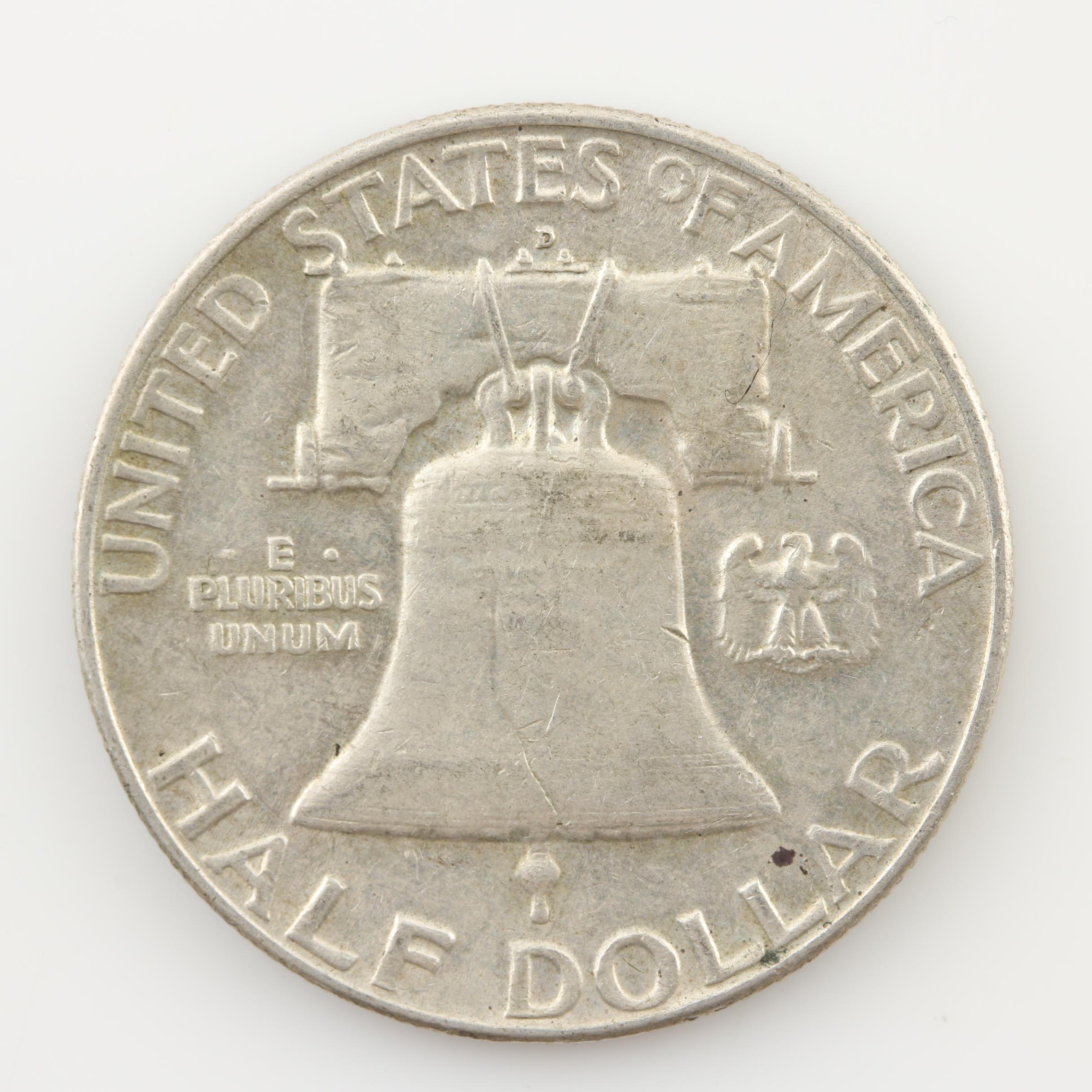 Group of Four Walking Liberty and Three Franklin Silver Half Dollars