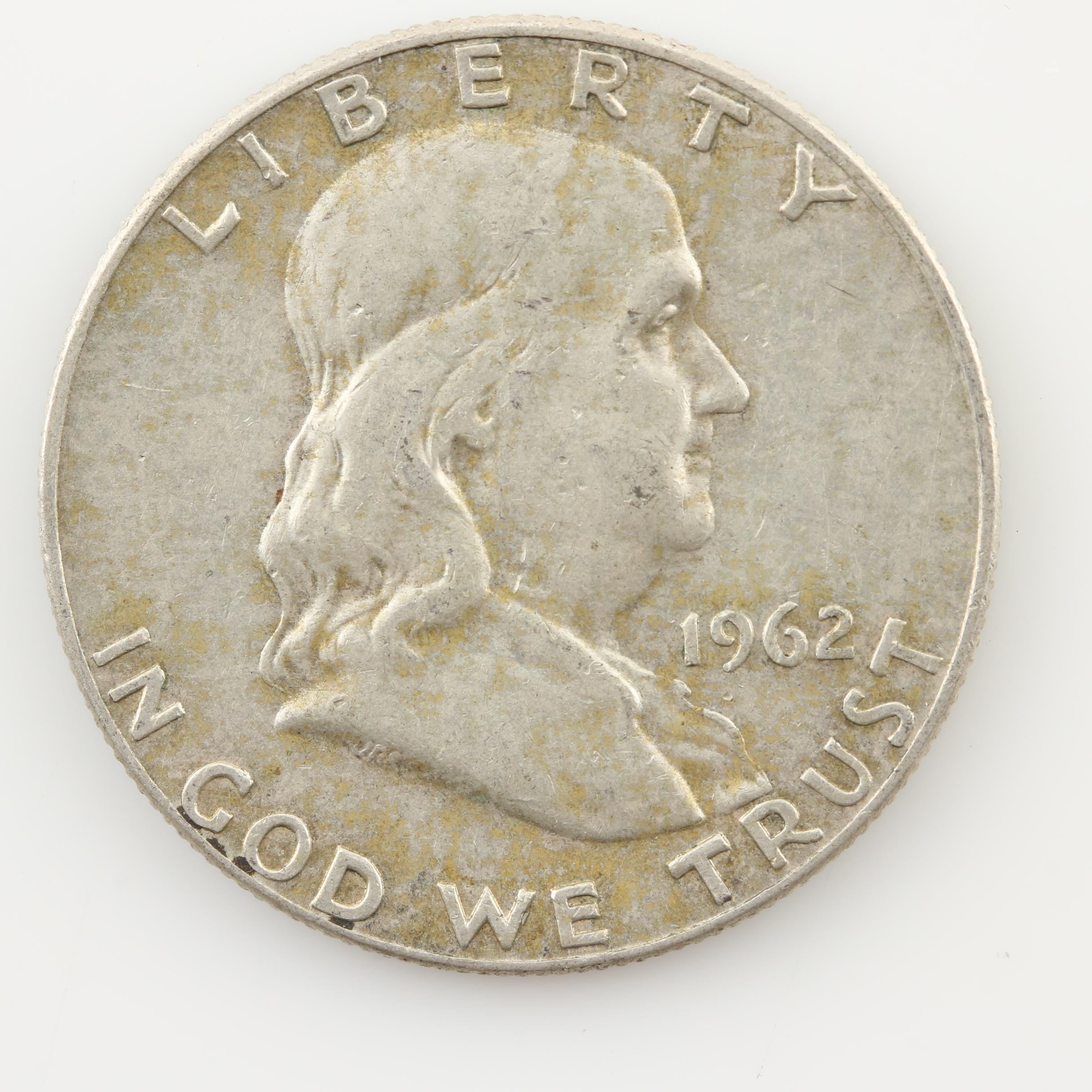 Group of Four Walking Liberty and Three Franklin Silver Half Dollars