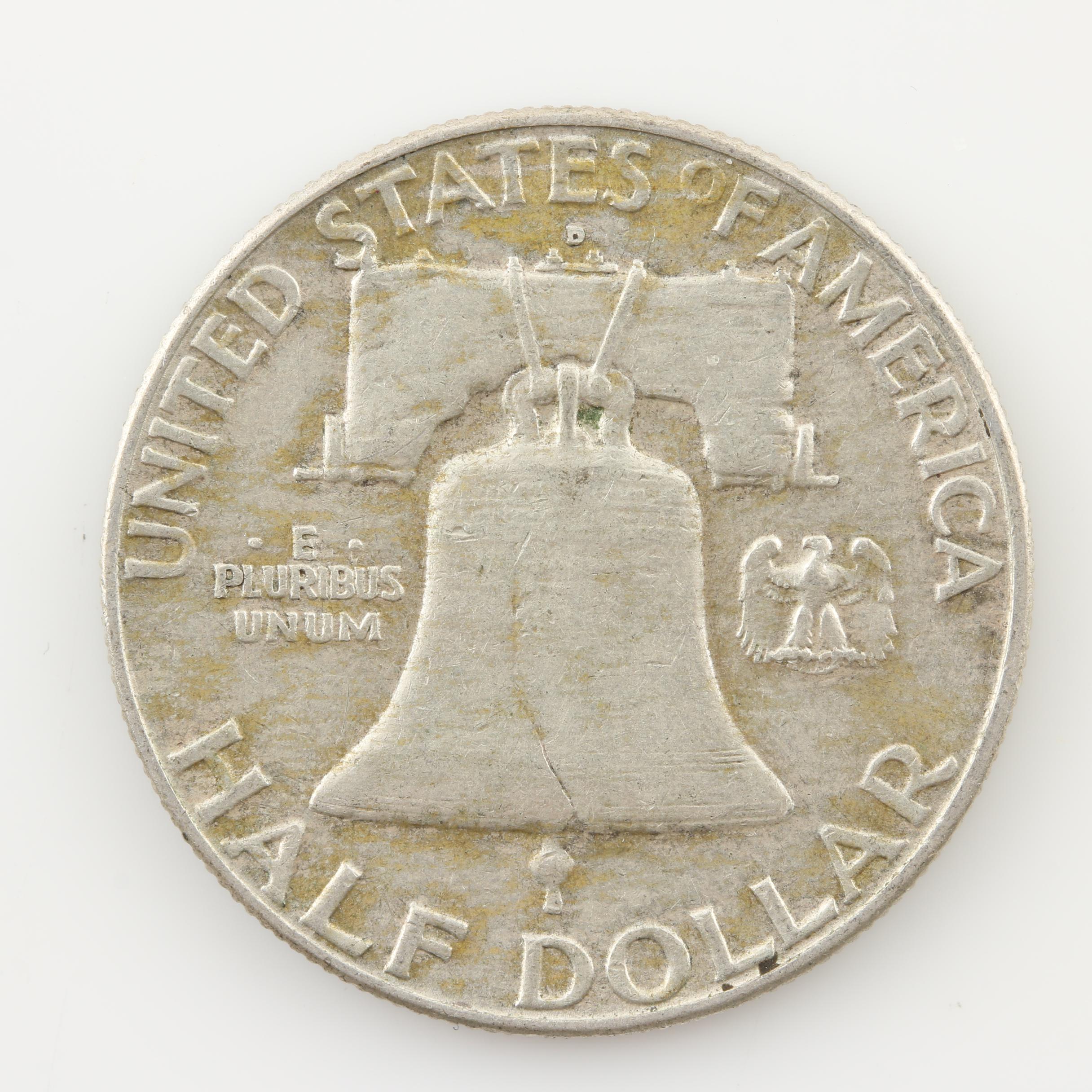 Group of Four Walking Liberty and Three Franklin Silver Half Dollars