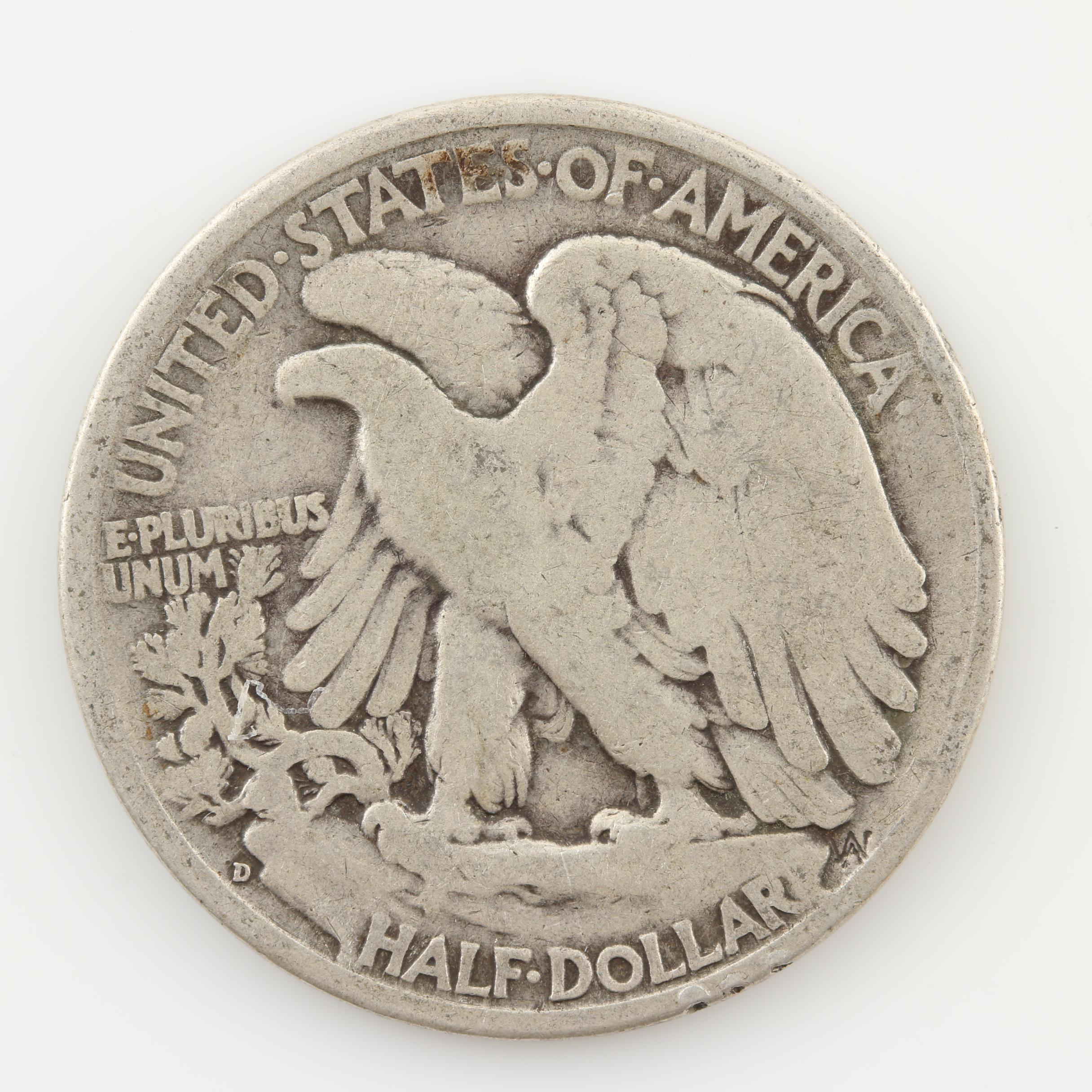 Group of Four Walking Liberty and Three Franklin Silver Half Dollars