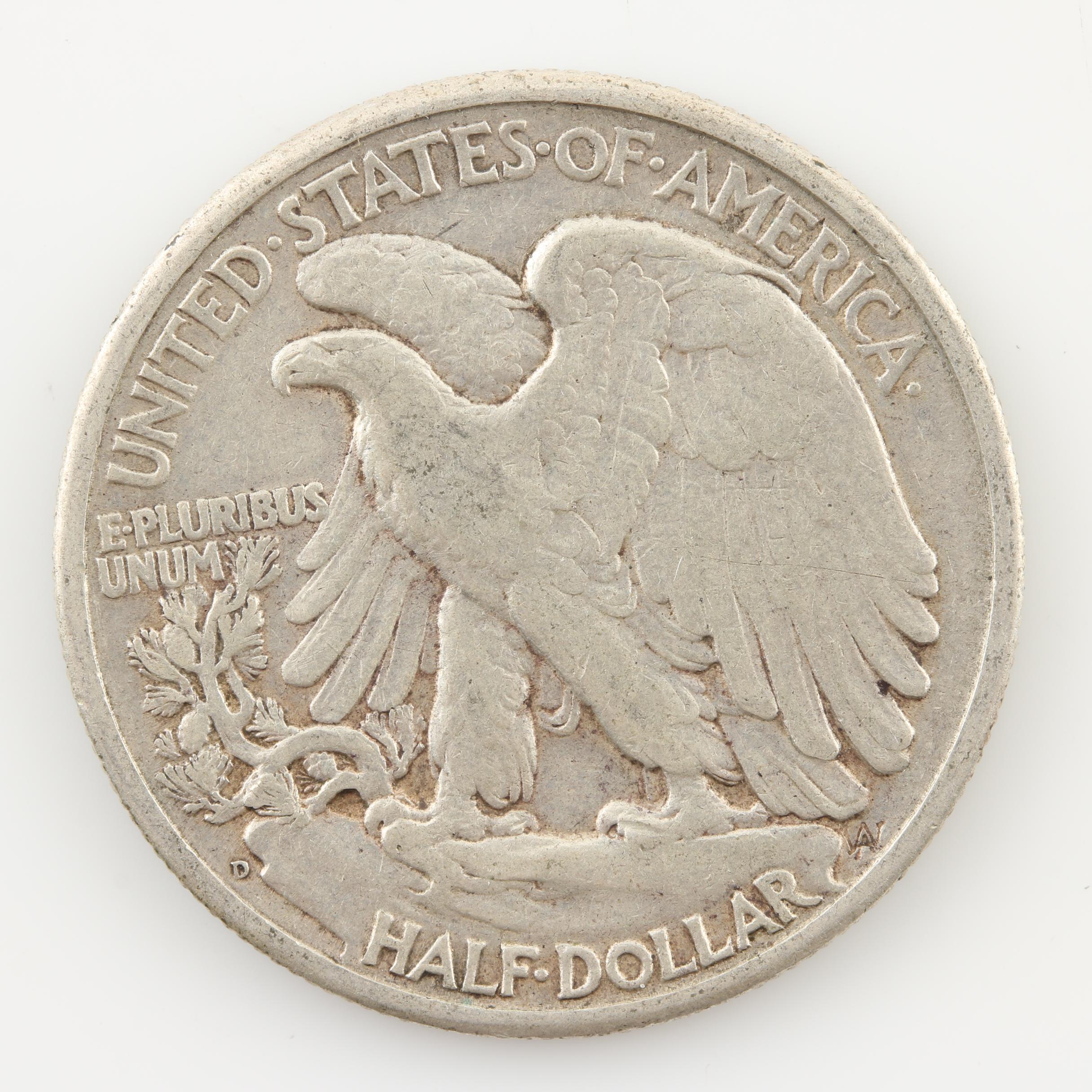 Group of Four Walking Liberty and Three Franklin Silver Half Dollars