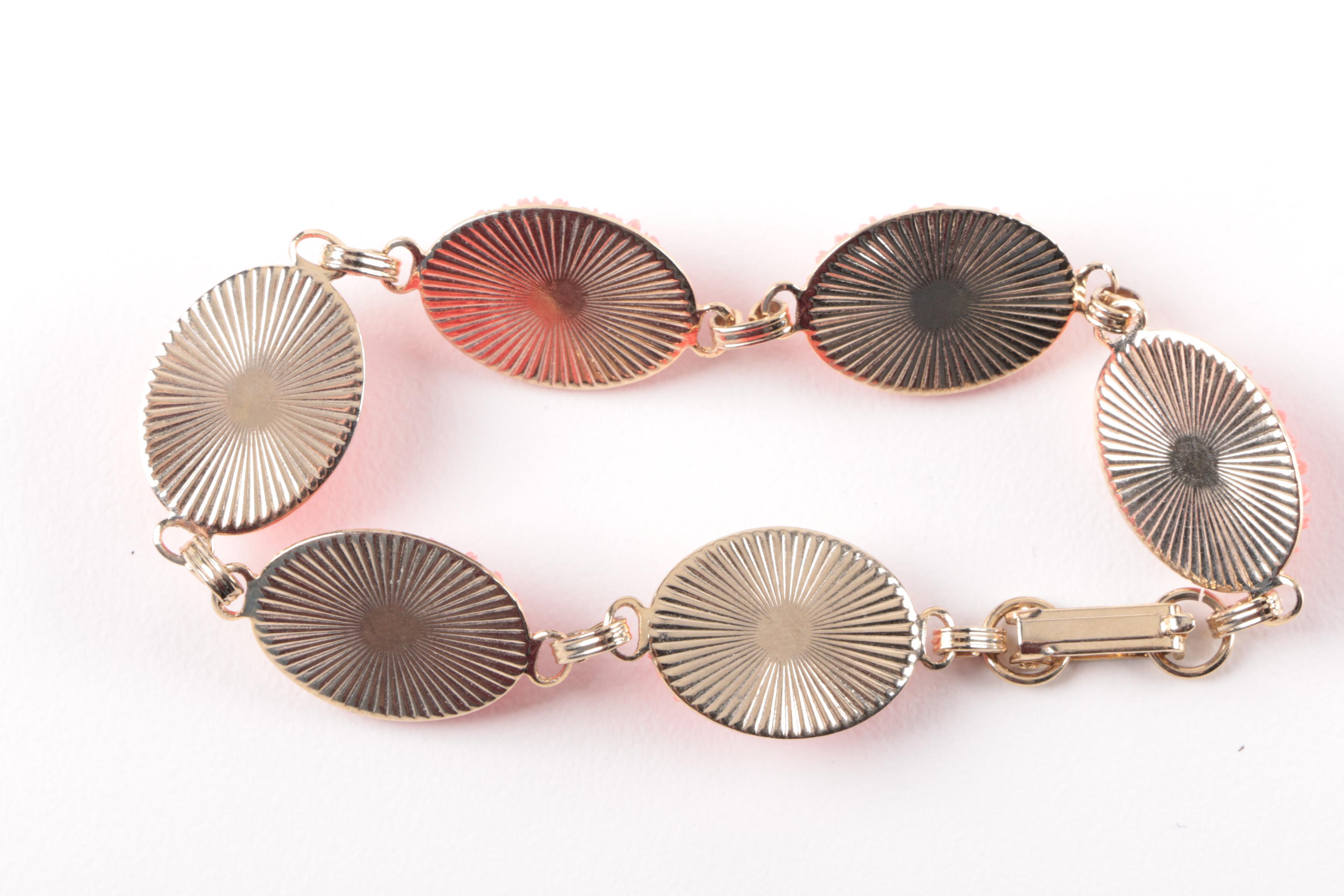 Assortment of Gold and Silver Tone Shell Cameo, Glass and Foilback Jewelry