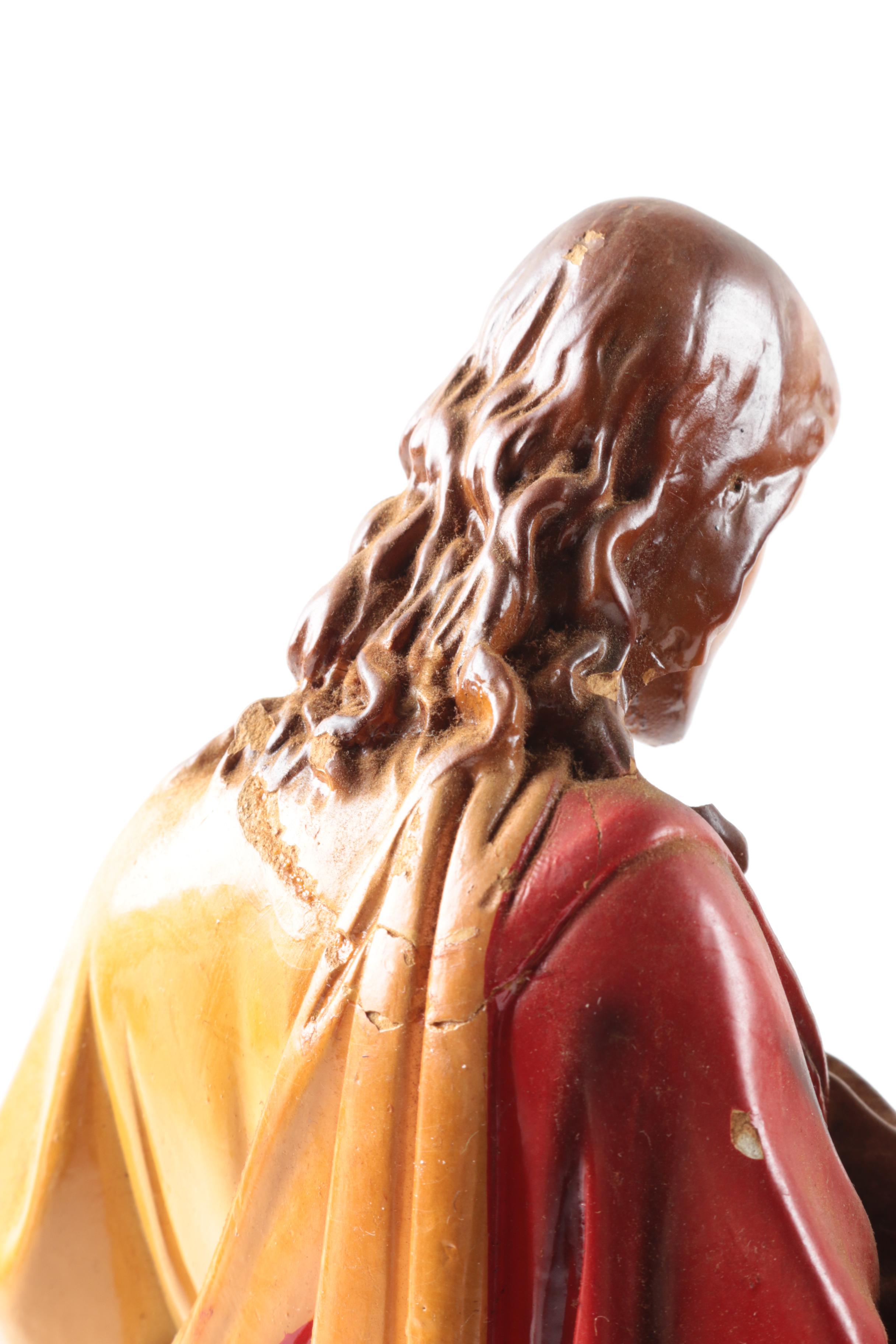 Christian Figurine Collection Including Jesus and Francis of Assisi