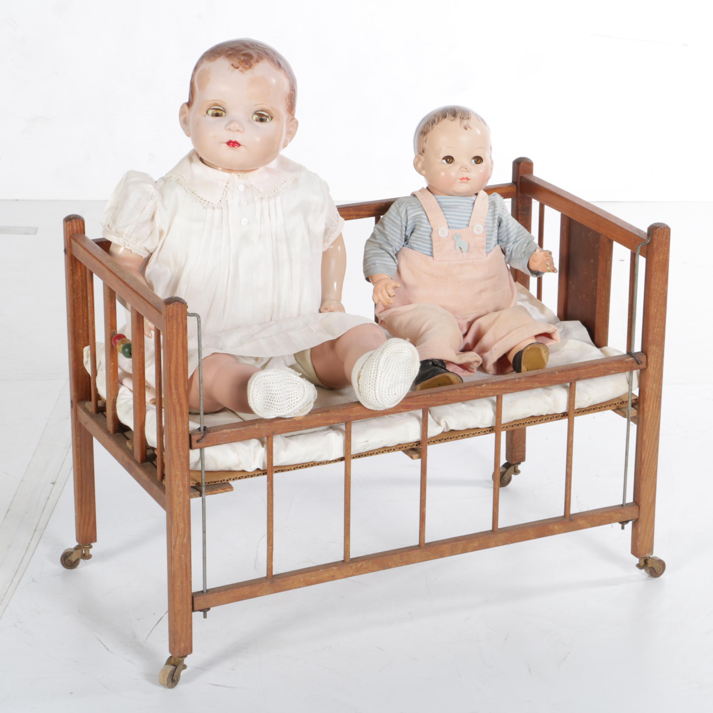 Circa 1950s Composition Baby Dolls with Wooden Toy Crib