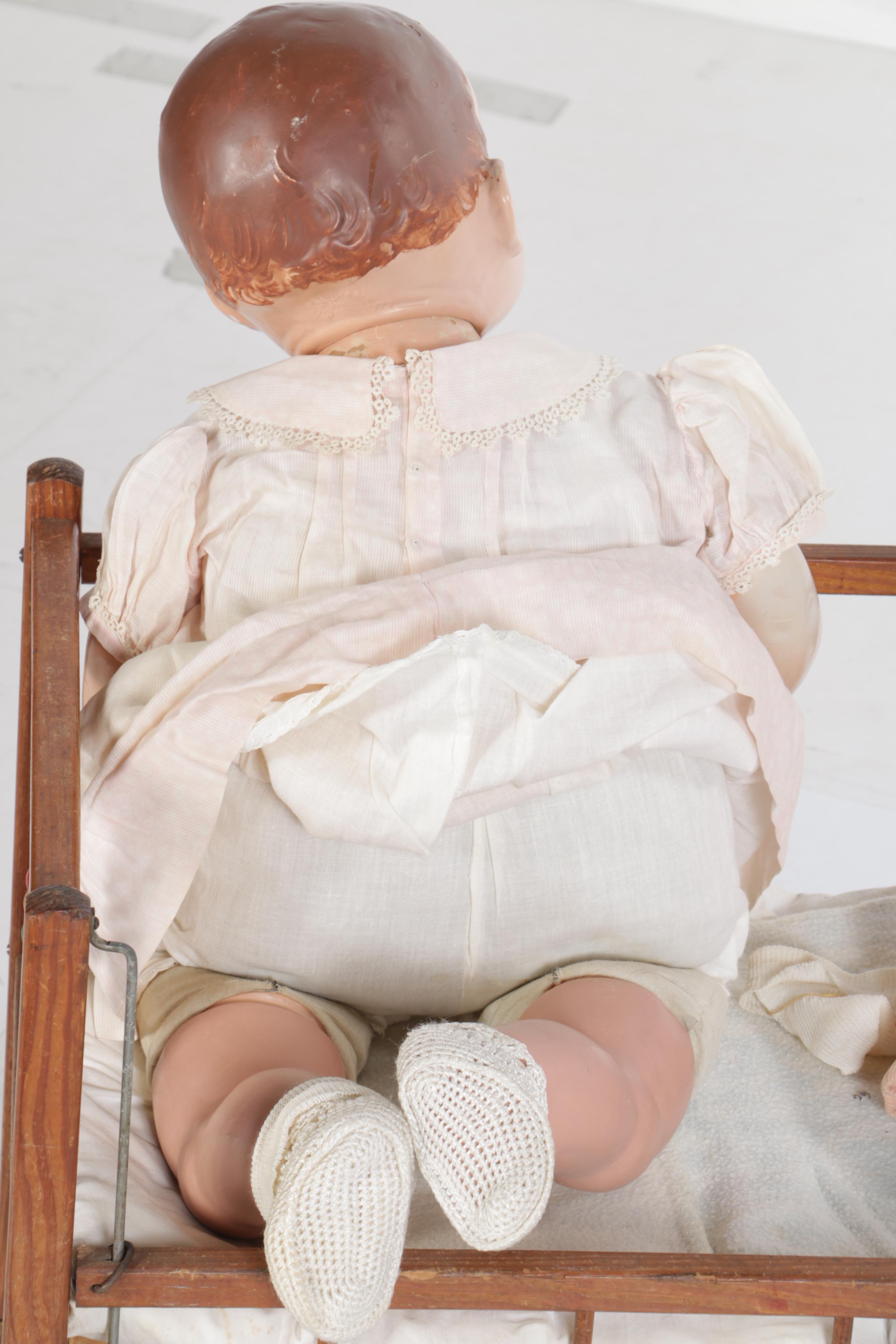 Circa 1950s Composition Baby Dolls with Wooden Toy Crib