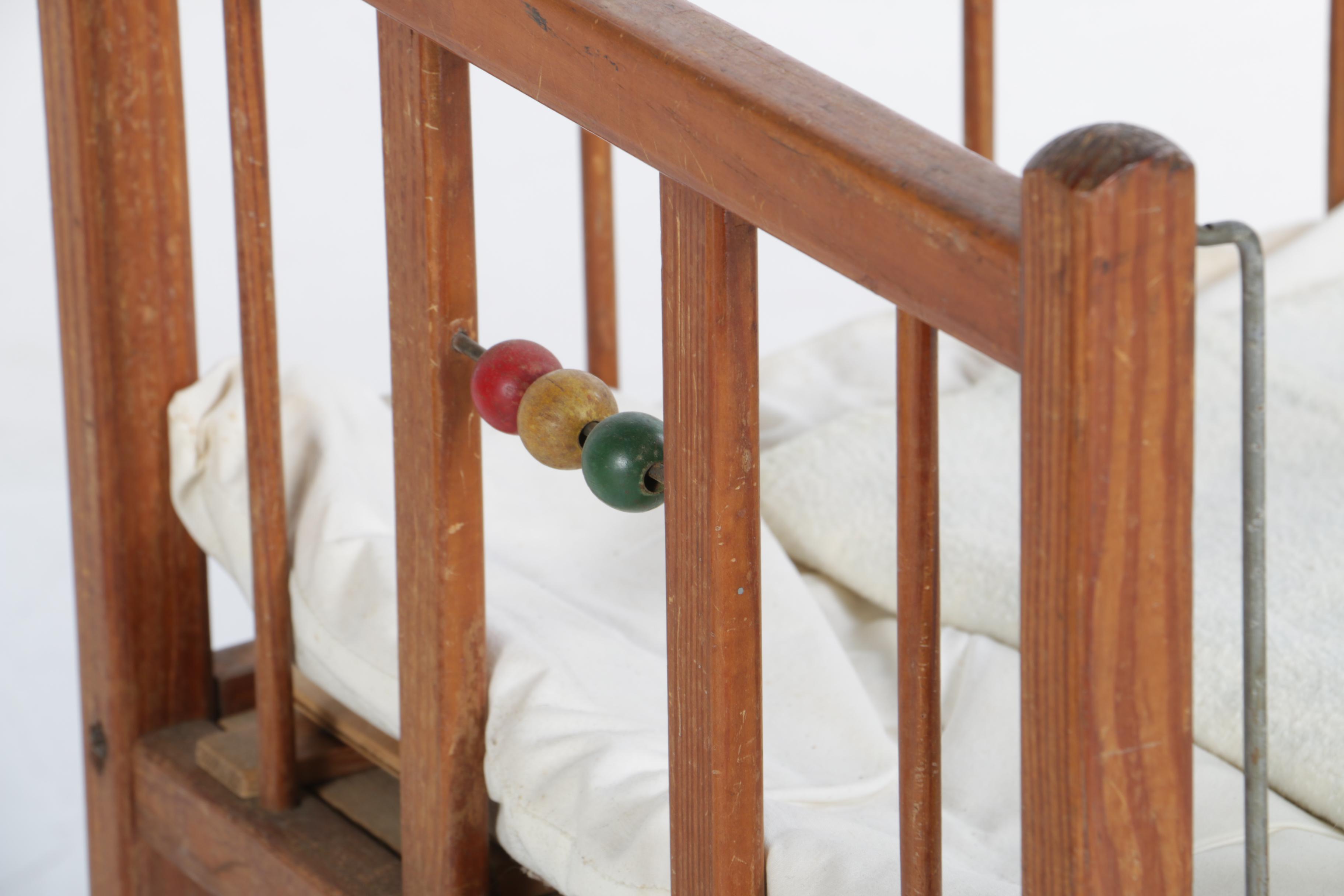 Circa 1950s Composition Baby Dolls with Wooden Toy Crib