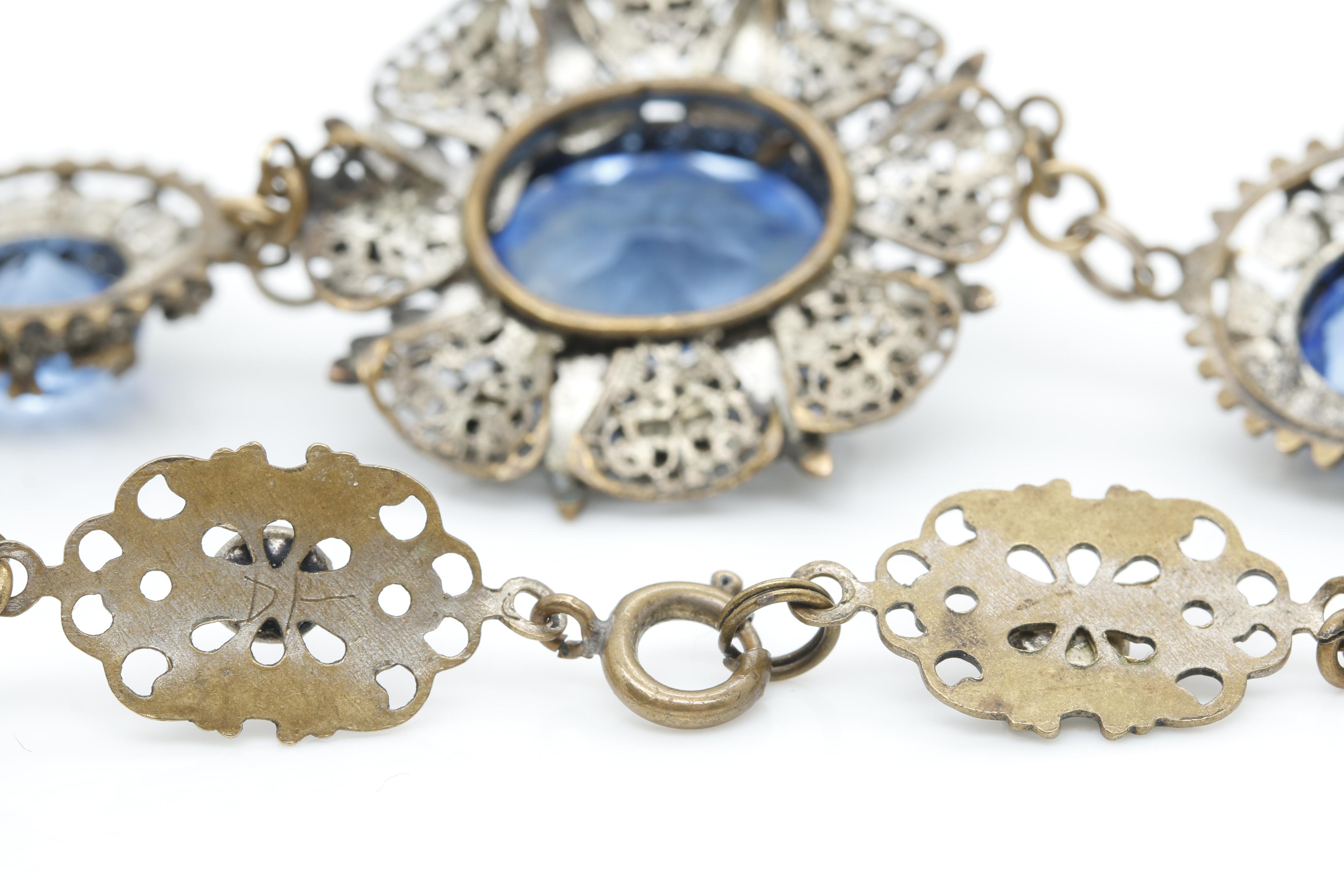 Costume Jewelry Selection Including Small Photo of a Nun